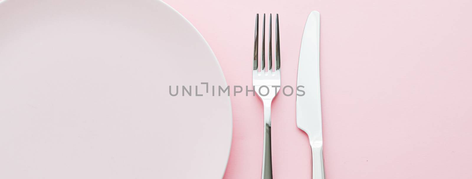 Empty plate and cutlery as mockup set on pink background, top tableware for chef table decor and menu branding by Anneleven