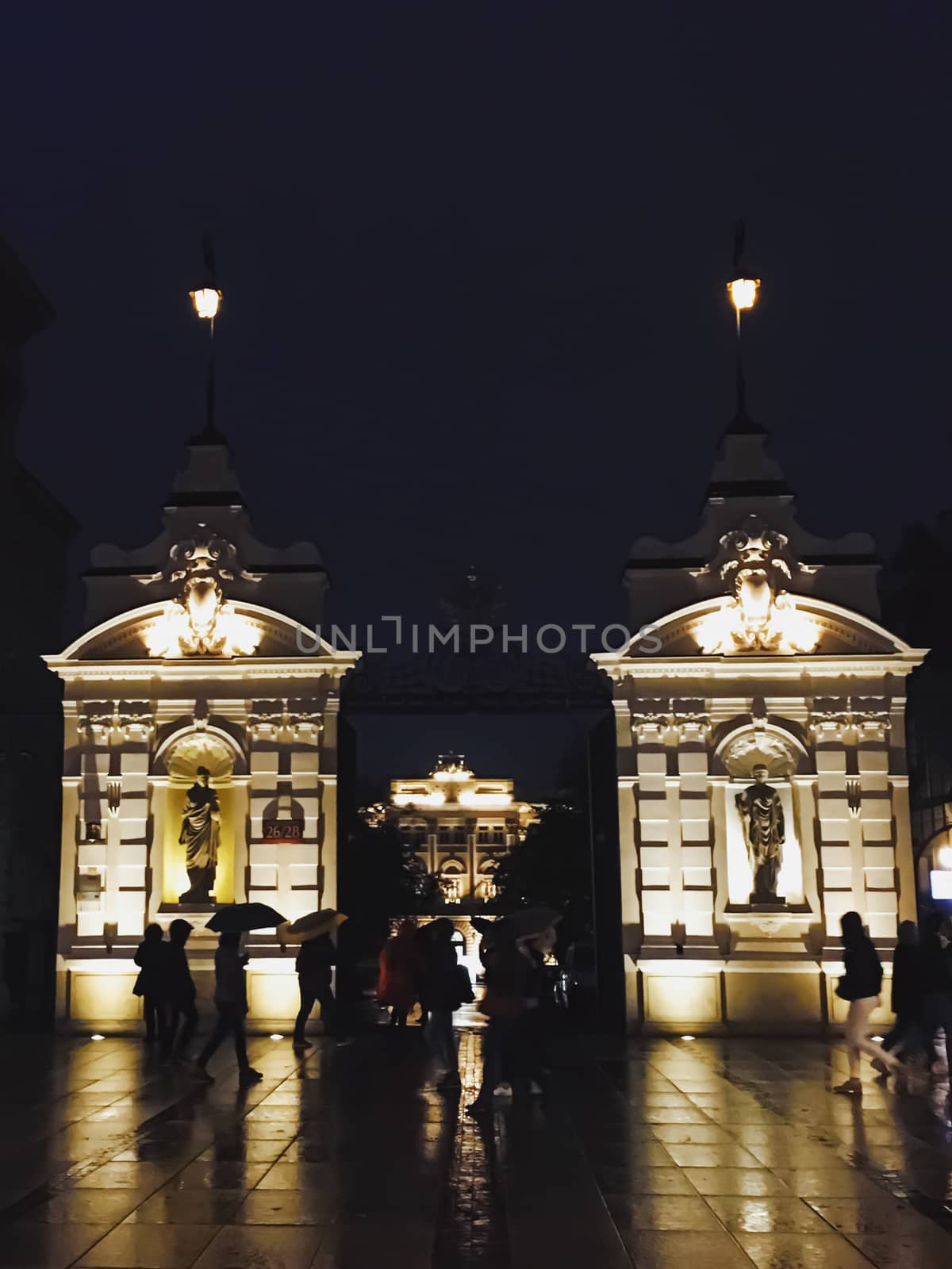 Exterior facade of classic building in the European city at night, architecture and design by Anneleven