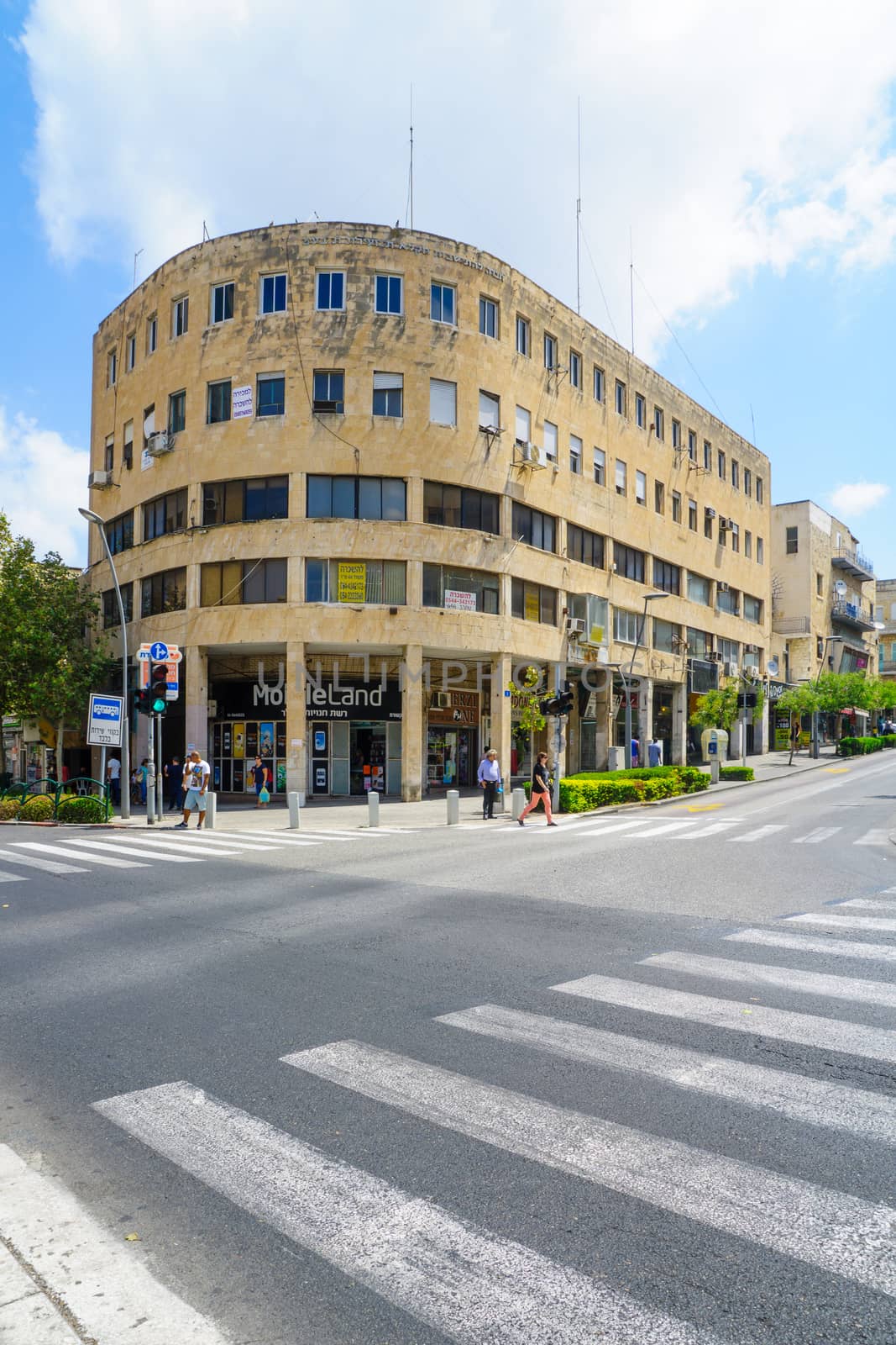 HAIFA, ISRAEL - AUGUST 18, 2016: Scene of Masaryk square in Hadar HaCarmel district, with local businesses, locals and visitors, in Haifa, Israel