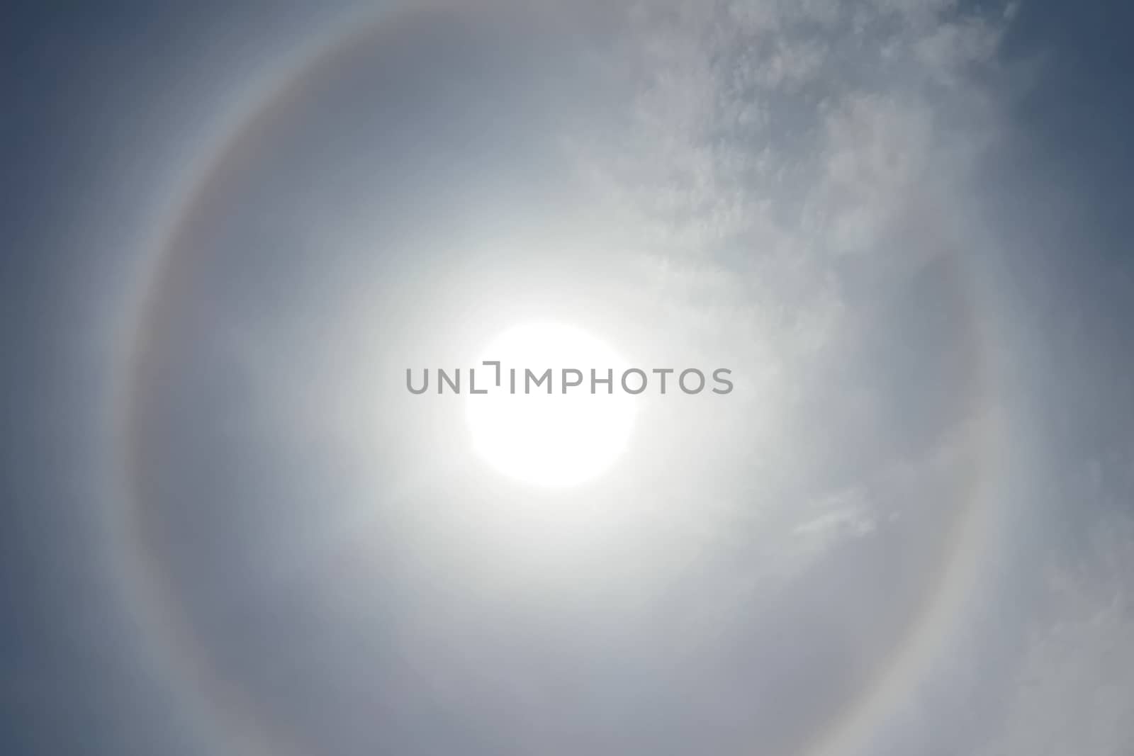 phenomenon of halo in the sky. A rare natural phenomenon. Three halo suns. by DePo