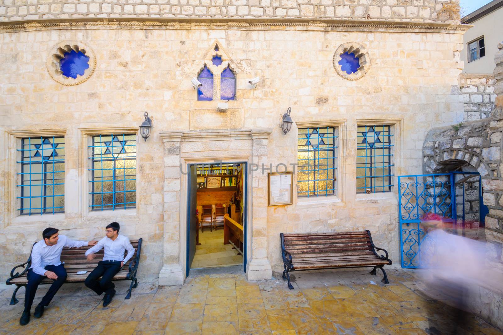 SAFED, ISRAEL - SEPTEMBER 14, 2016: The Ashkenazi HaAri Synagogue, in the Jewish quarter, with prayers, in Safed (Tzfat), Israel