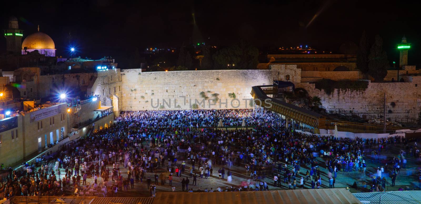 JERUSALEM, ISRAEL - SEPTEMBER 23, 2016: Scene of the western wall with a huge crowd of Selichot (Jewish penitential prays) prayers, in the old city of Jerusalem, Israel. Its an annual Jewish tradition