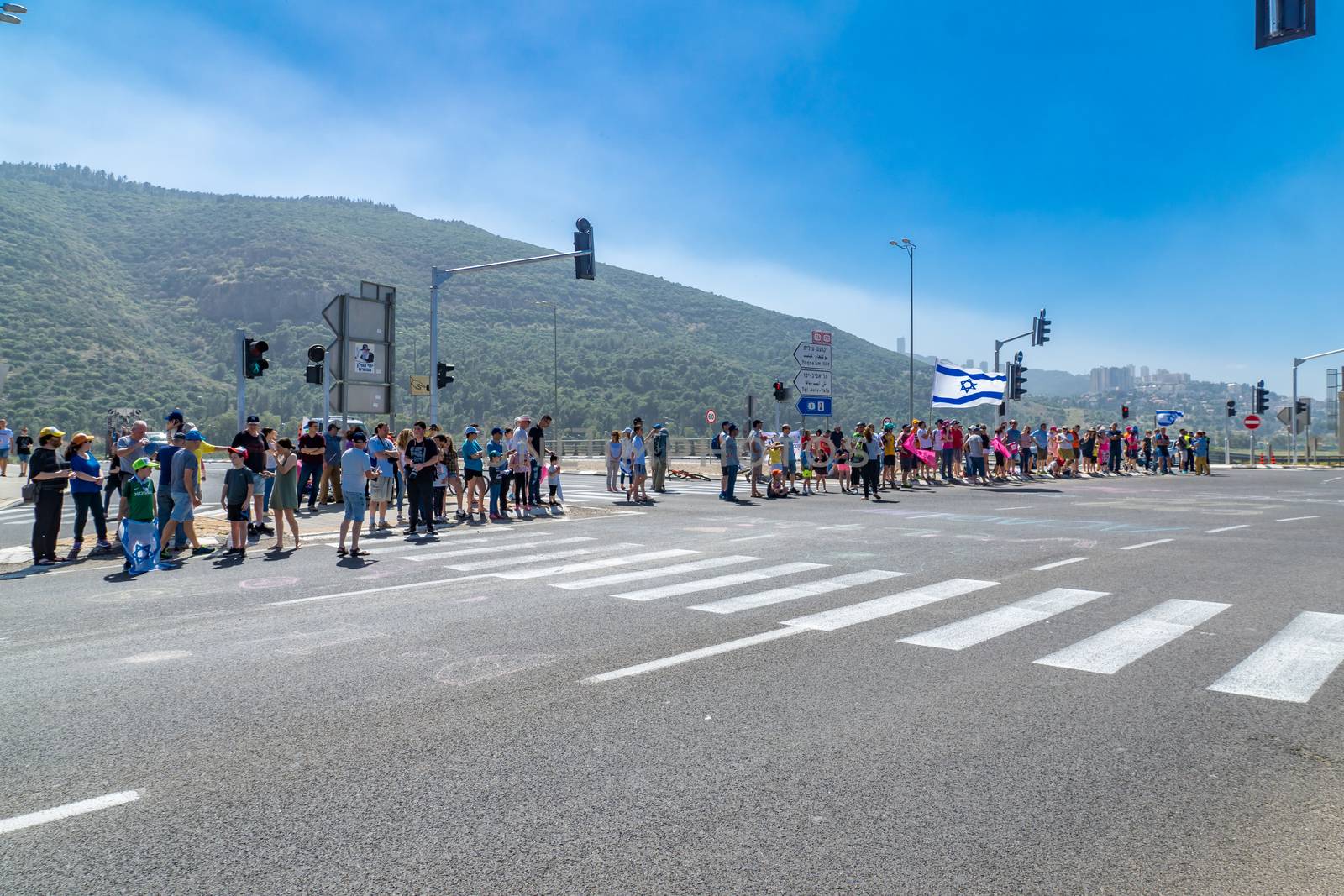 YAGUR, ISRAEL - MAY 05, 2018: Spectators wait for stage 2 of 2018 Giro d Italia, in Yagur, Israel