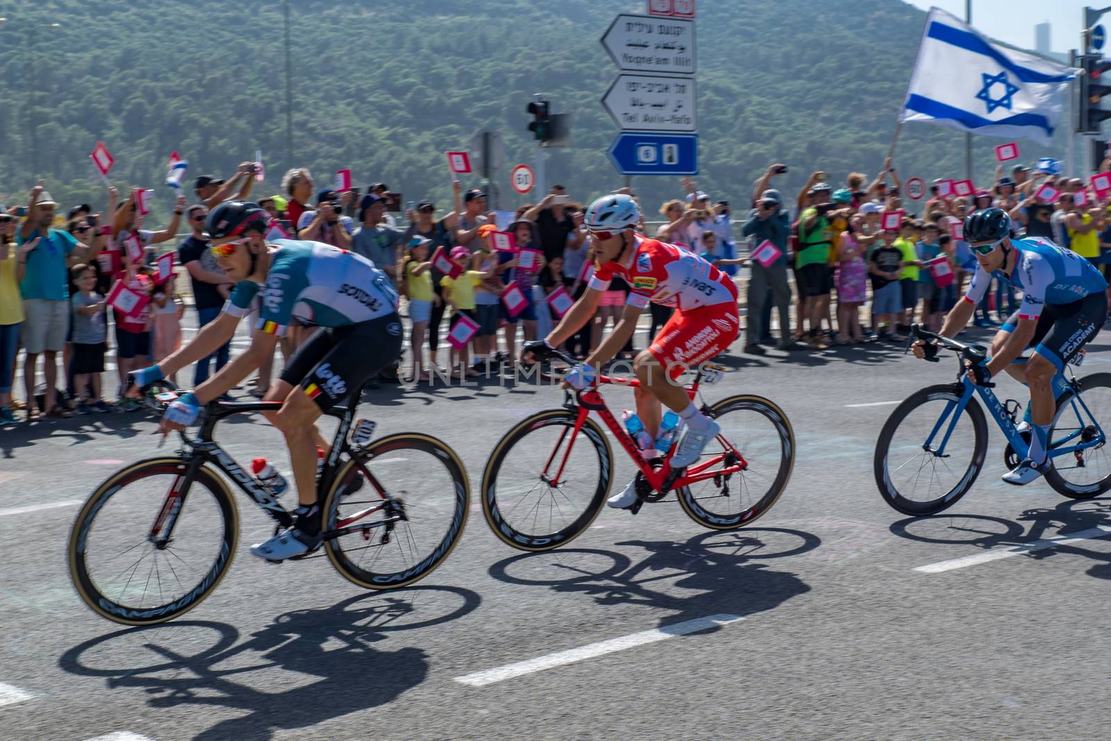 YAGUR, ISRAEL - MAY 05, 2018: Scene of stage 2 of 2018 Giro d Italia, with escape group cyclists and spectators, in Yagur, Israel