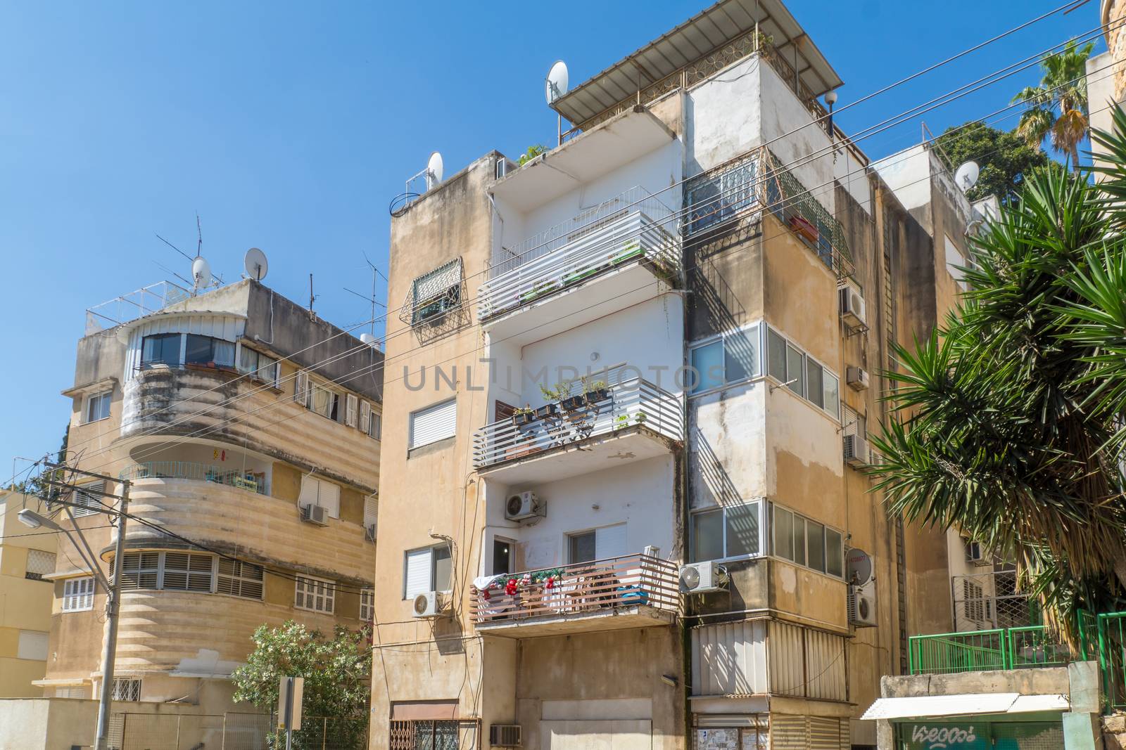 HAIFA, ISRAEL - JUNE 09, 2018: Buildings with a mixture of international (Bauhaus) and Arabic styles, in Hadar HaCarmel neighborhood, Haifa, Israel
