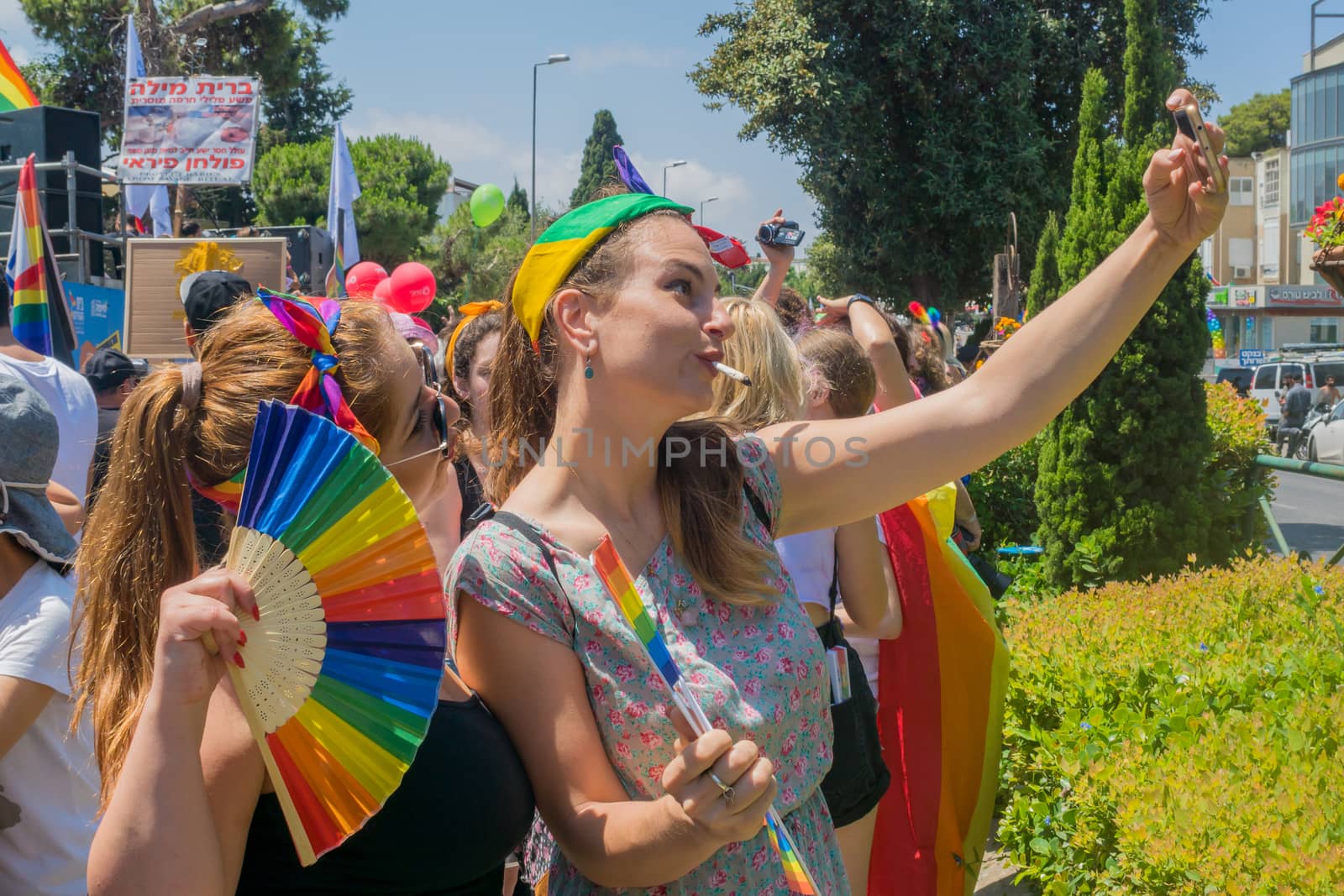 HAIFA, ISRAEL - JUNE 22, 2018: Various people take part and take selfies, in the annual pride parade of the LGBT community, in Haifa, Israel