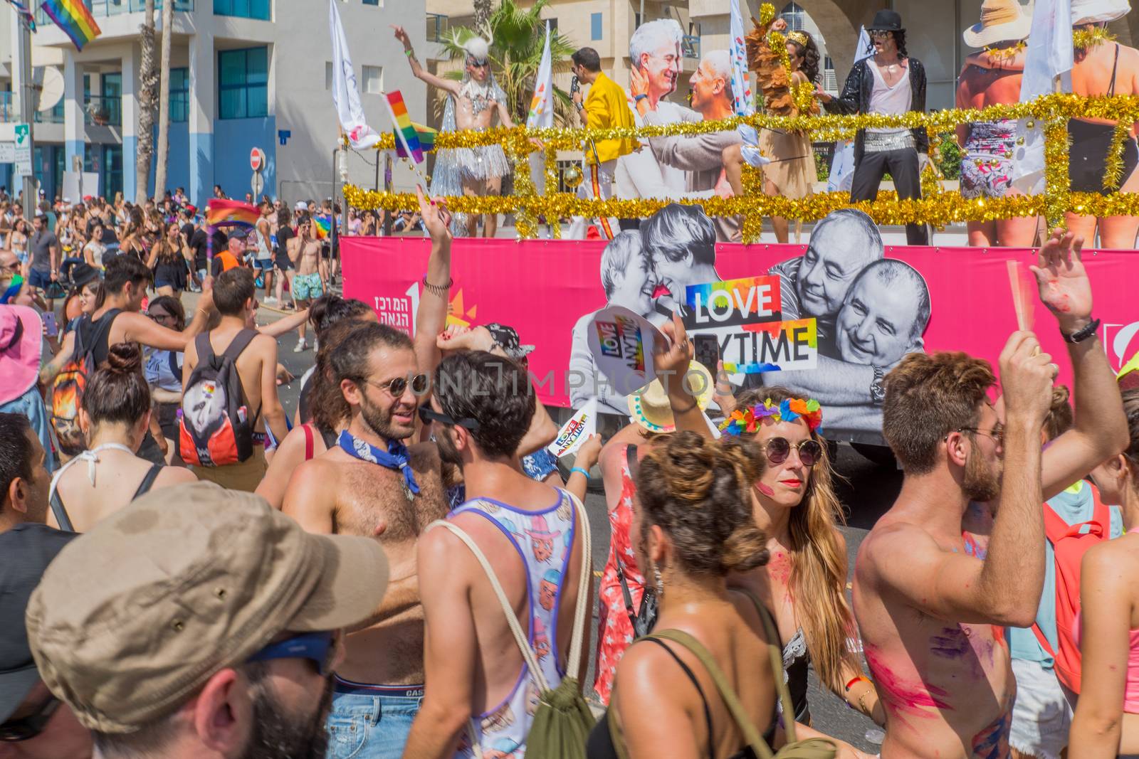 TEL-AVIV, ISRAEL - JUNE 08, 2018: Dancers of a truck entertain the crowd, and take part in the annual pride parade of the LGBT community, in Tel-Aviv, Israel