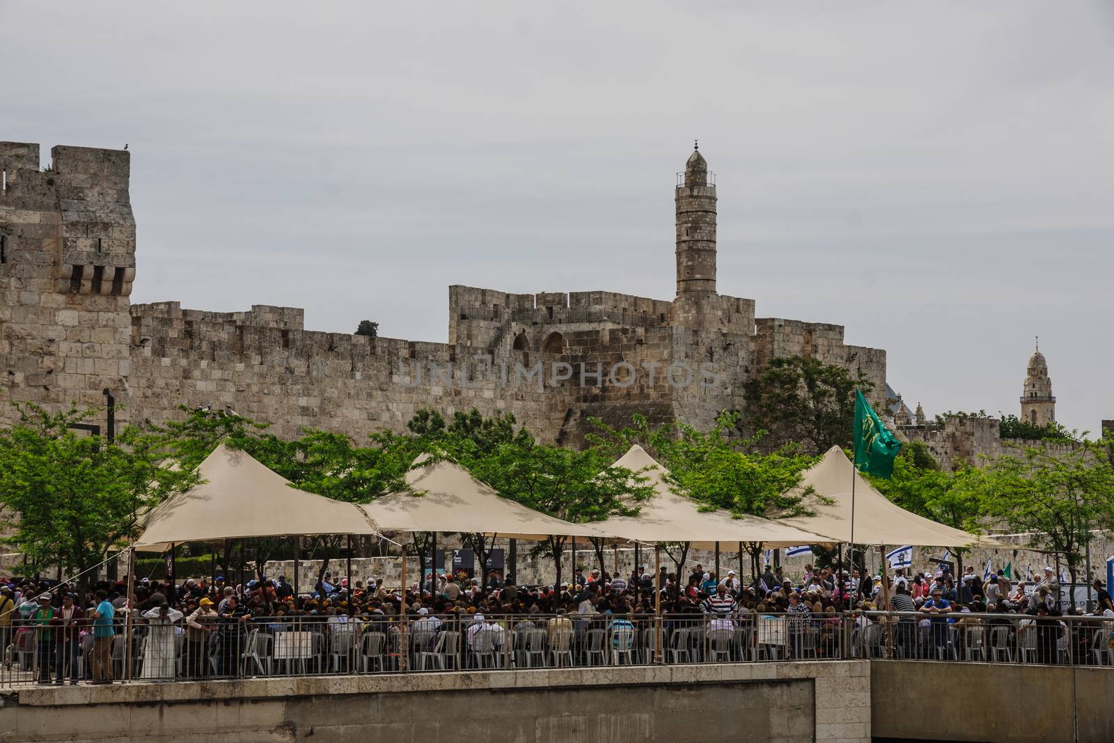 JERUSALEM - APRIL 19, 2014: A crowd of pilgrims outside the Jaffa Gate (in the walls of the old city) waiting for the holy fire ceremony, on Holy Saturday, in Jerusalem, Israel