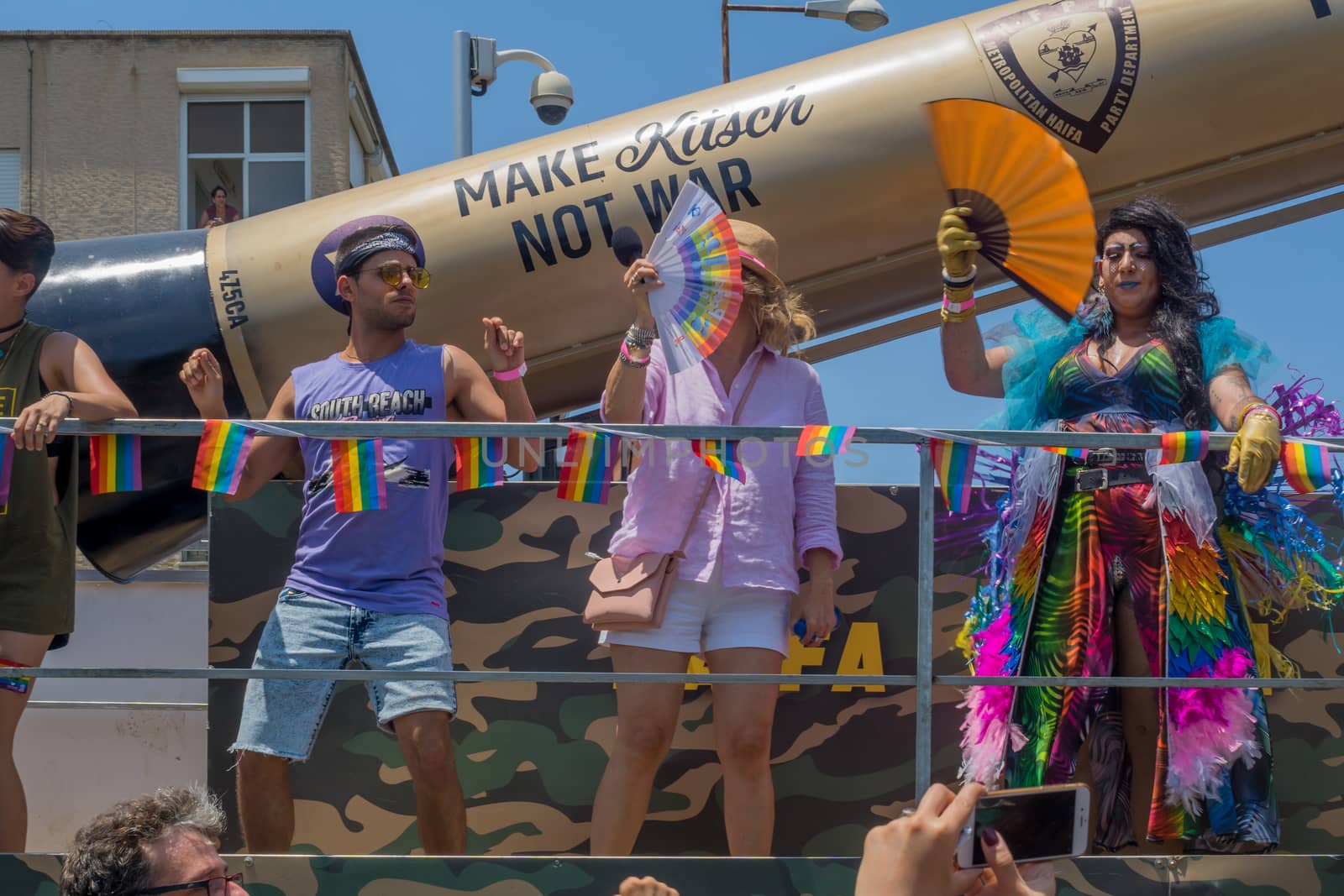 HAIFA, ISRAEL - JUNE 22, 2018: Dancers on a truck entertain the crowd, in the annual pride parade of the LGBT community, in Haifa, Israel