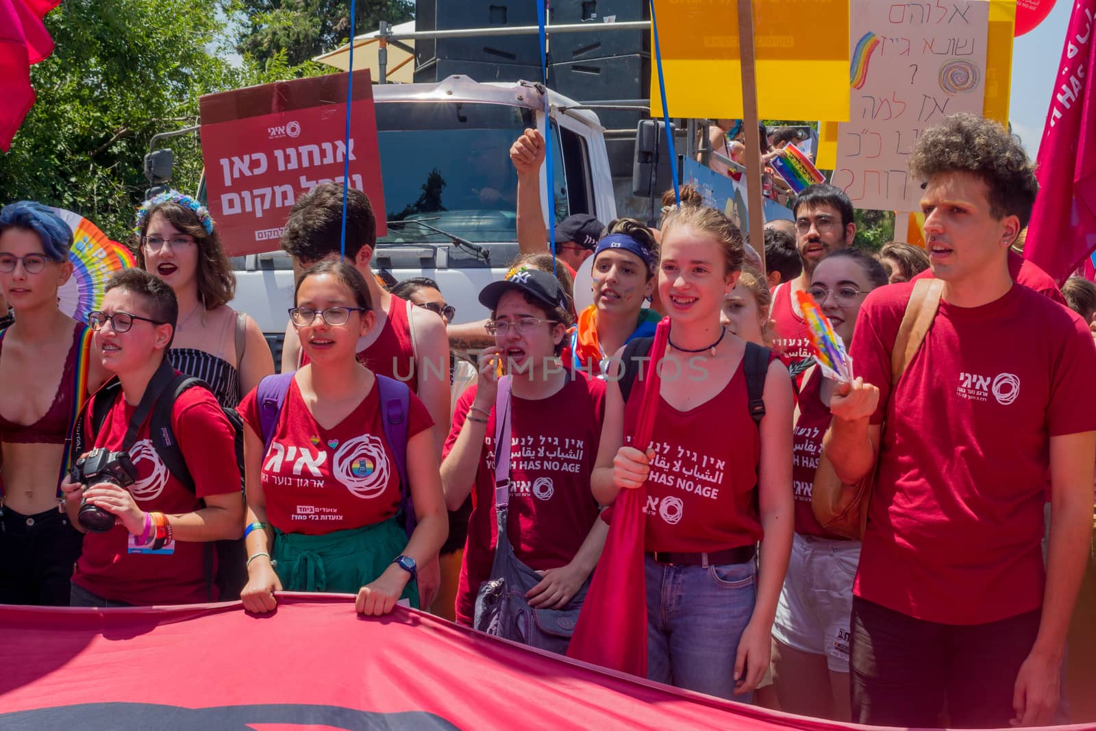 HAIFA, ISRAEL - JUNE 22, 2018: Various people take part and carry signs, in the annual pride parade of the LGBT community, in Haifa, Israel