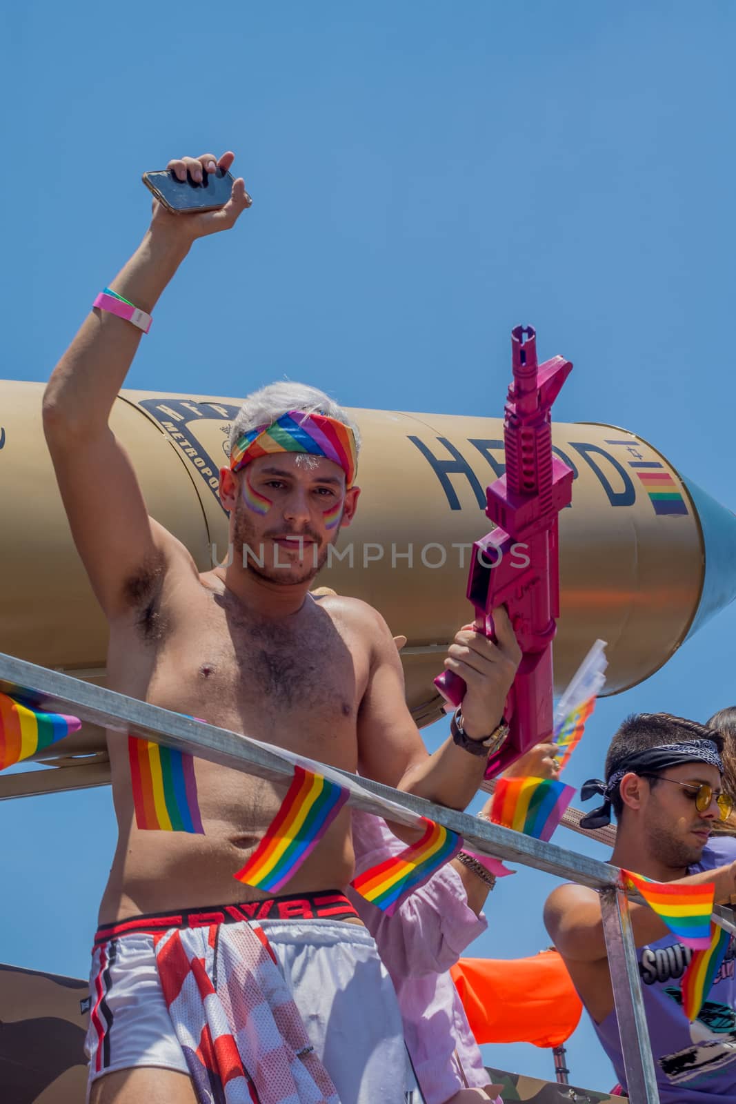 HAIFA, ISRAEL - JUNE 22, 2018: Dancers on a truck entertain the crowd, in the annual pride parade of the LGBT community, in Haifa, Israel