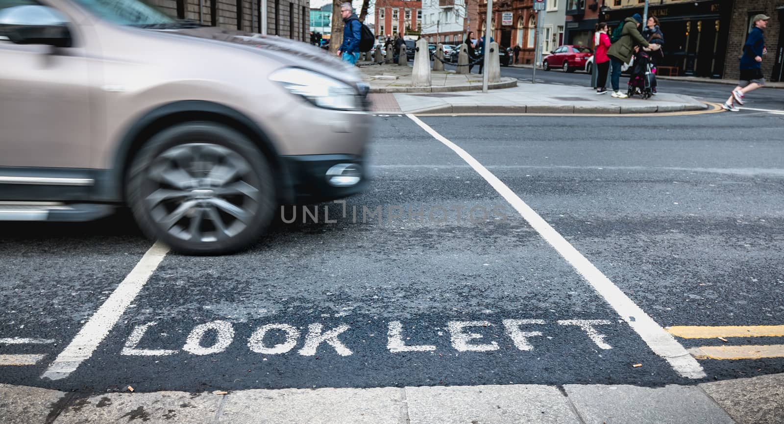Look Left painted on the road on a pedestrian crossing in Dublin by AtlanticEUROSTOXX