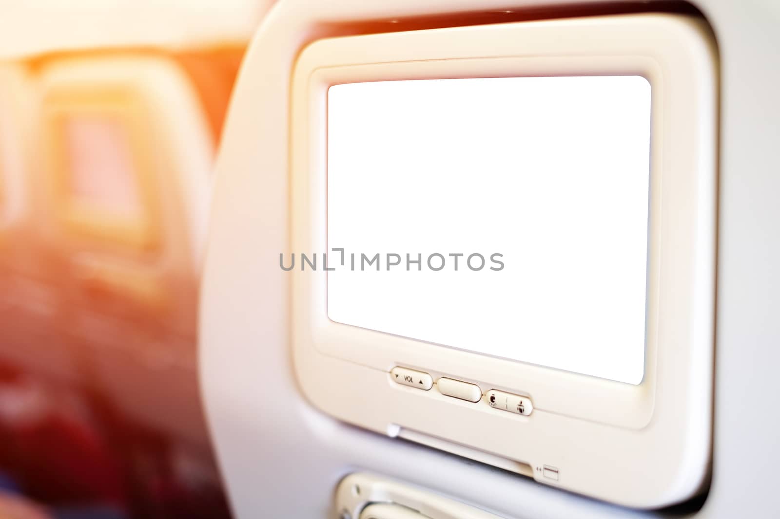 Aircraft monitor in passenger seat isolated on white background with clipping path