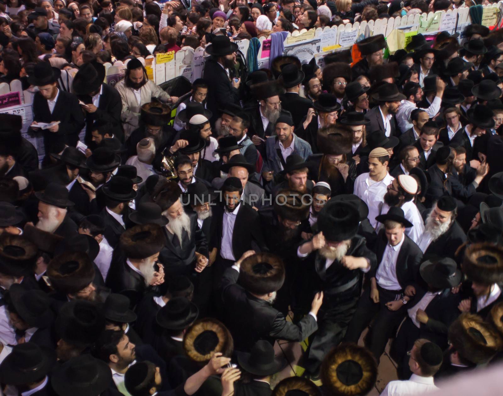 MERON, ISRAEL - MAY 18, 2014: Orthodox Jews dance at the annual hillulah of Rabbi Shimon Bar Yochai, in Meron, on Lag BaOmer Holiday. This is an annual celebration at the tomb of Rabbi Shimon