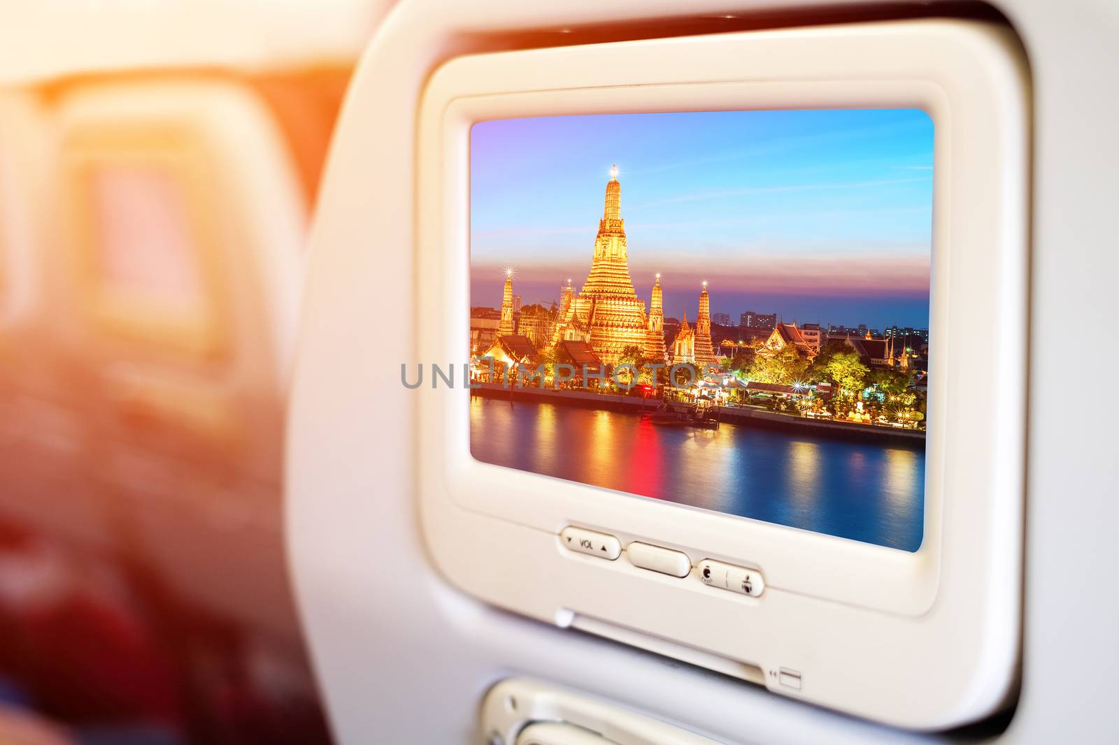 Aircraft monitor in passenger seat on Wat Arun night view Temple by Surasak