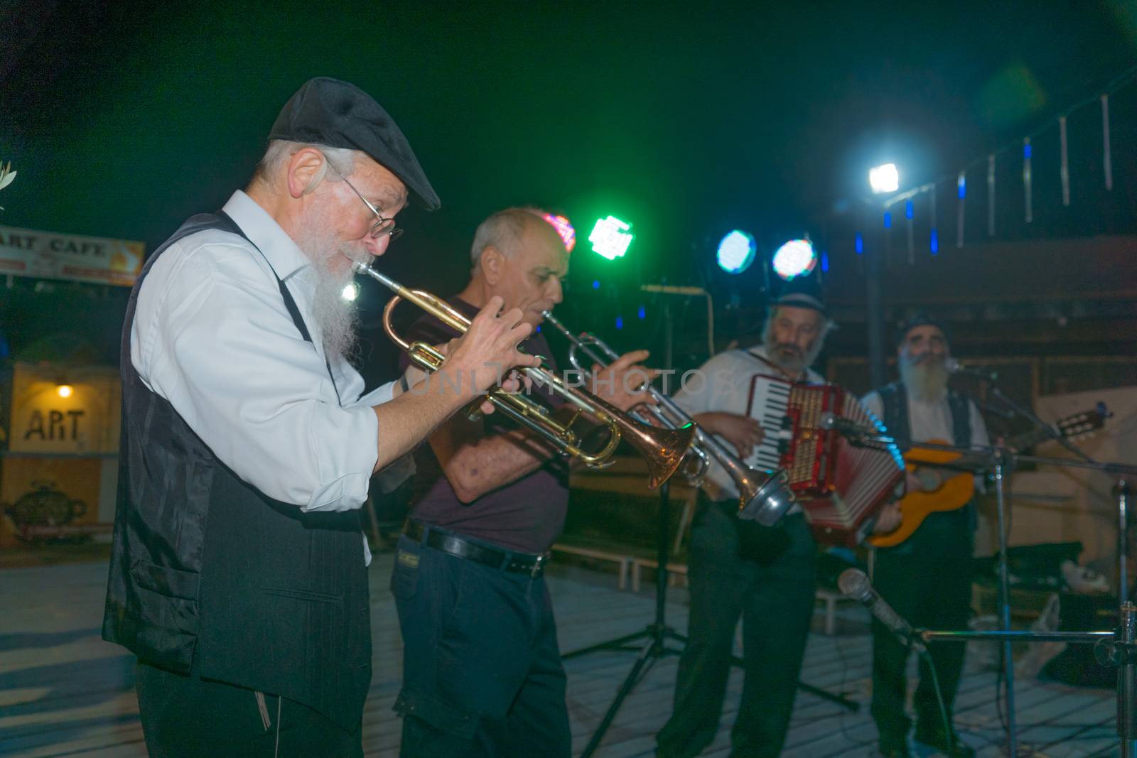Safed, Israel - August 14, 2018: Scene of the Klezmer Festival, with street musicians playing, in Safed (Tzfat), Israel. Its the 31st annual traditional Jewish festival in the public streets of Safed