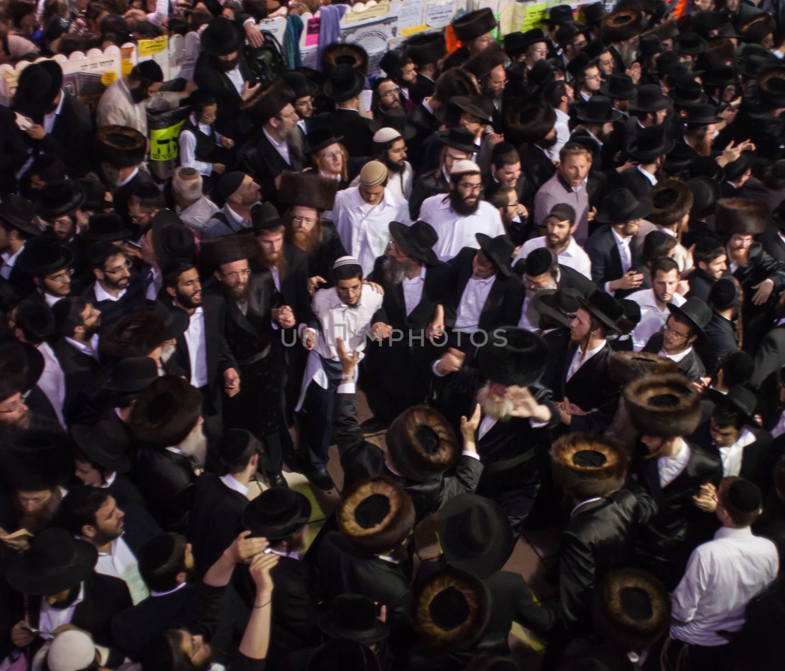 MERON, ISRAEL - MAY 18, 2014: Orthodox Jews dance at the annual hillulah of Rabbi Shimon Bar Yochai, in Meron, on Lag BaOmer Holiday. This is an annual celebration at the tomb of Rabbi Shimon