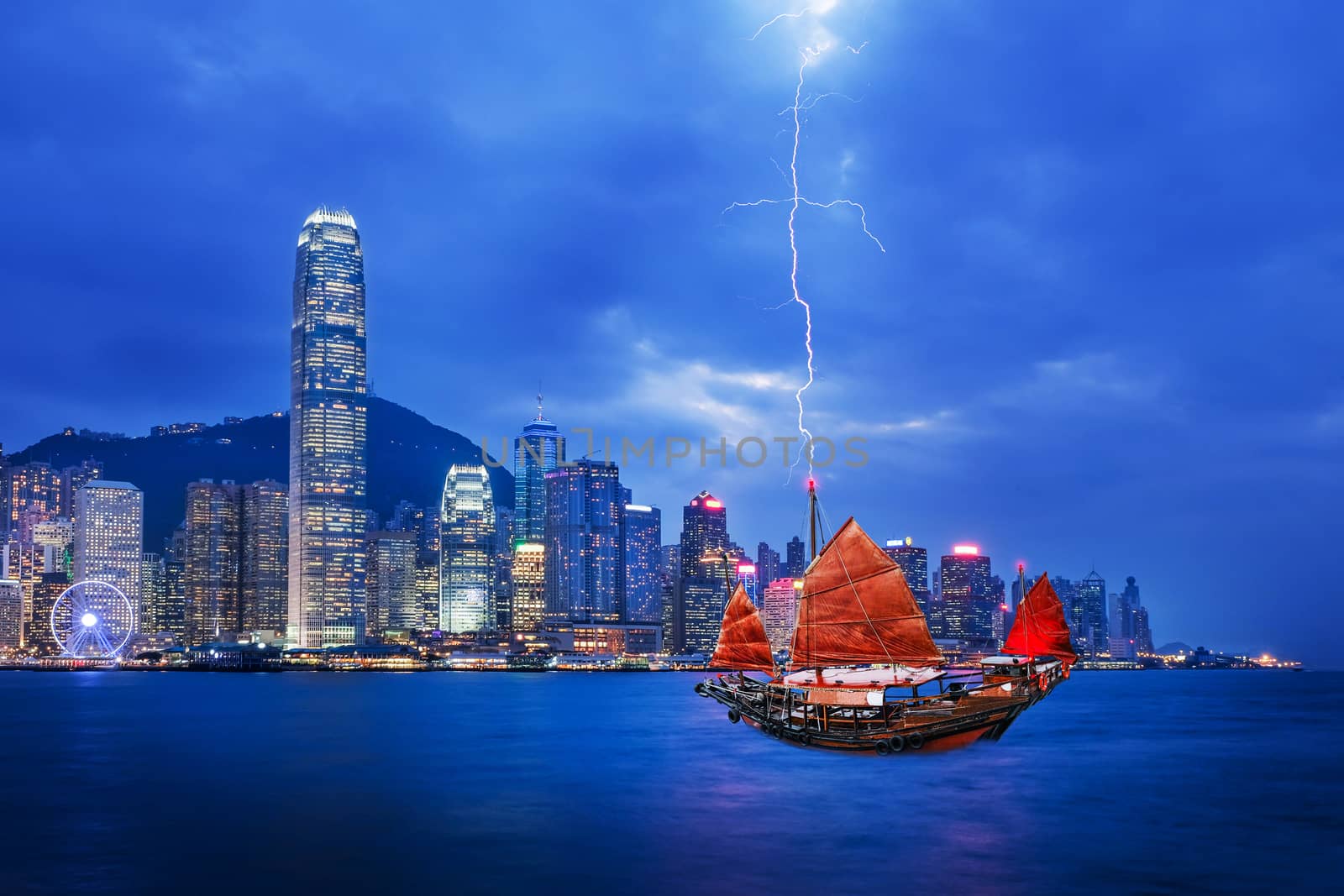 Red sailboat flag and thunderstorm in Hong Kong harbor by Surasak