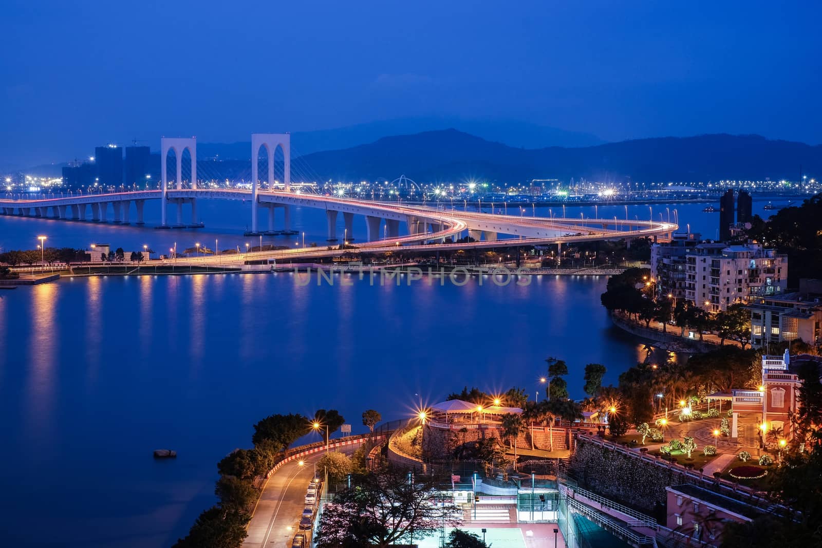 Bridge in Macau view at night

 by Surasak