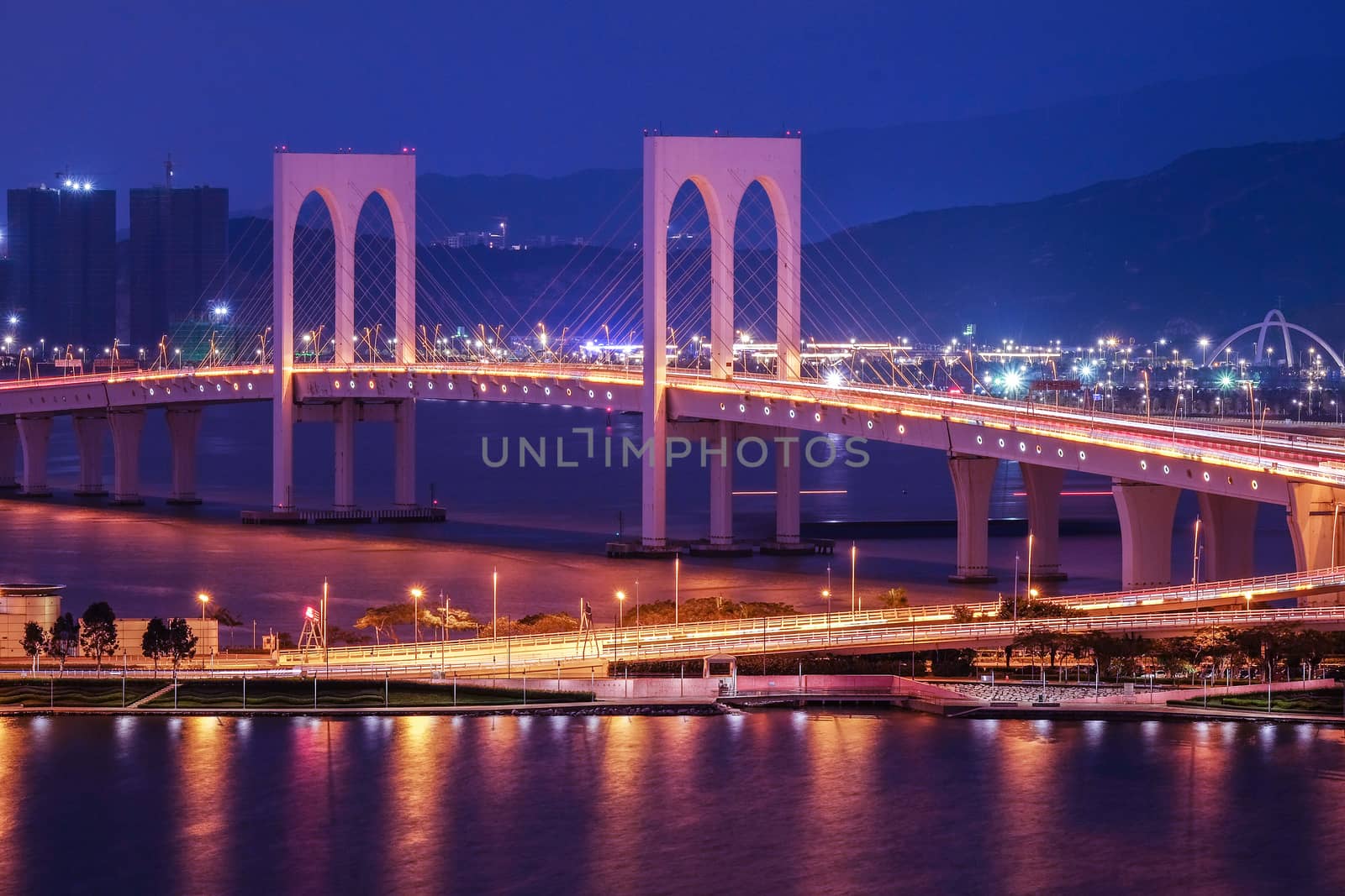 Bridge in Macau view at night by Surasak