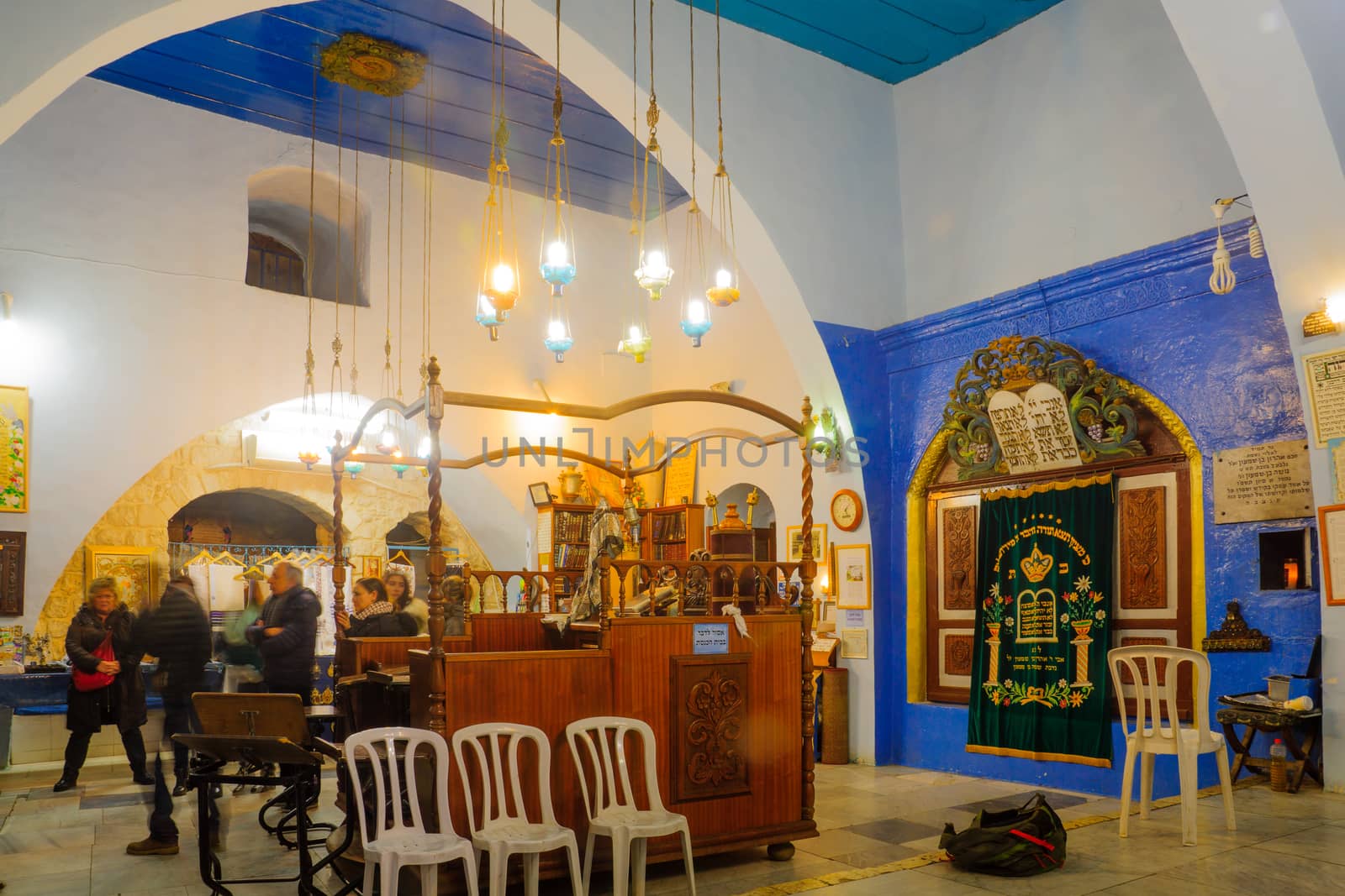 SAFED, ISRAEL - DECEMBER 26, 2016: The Yosef Caro Synagogue, with visitors, in the Jewish quarter, Safed (Tzfat), Israel. Its a 16th-century, named after the Rabbi Joseph Caro, scholar and Kabbalist