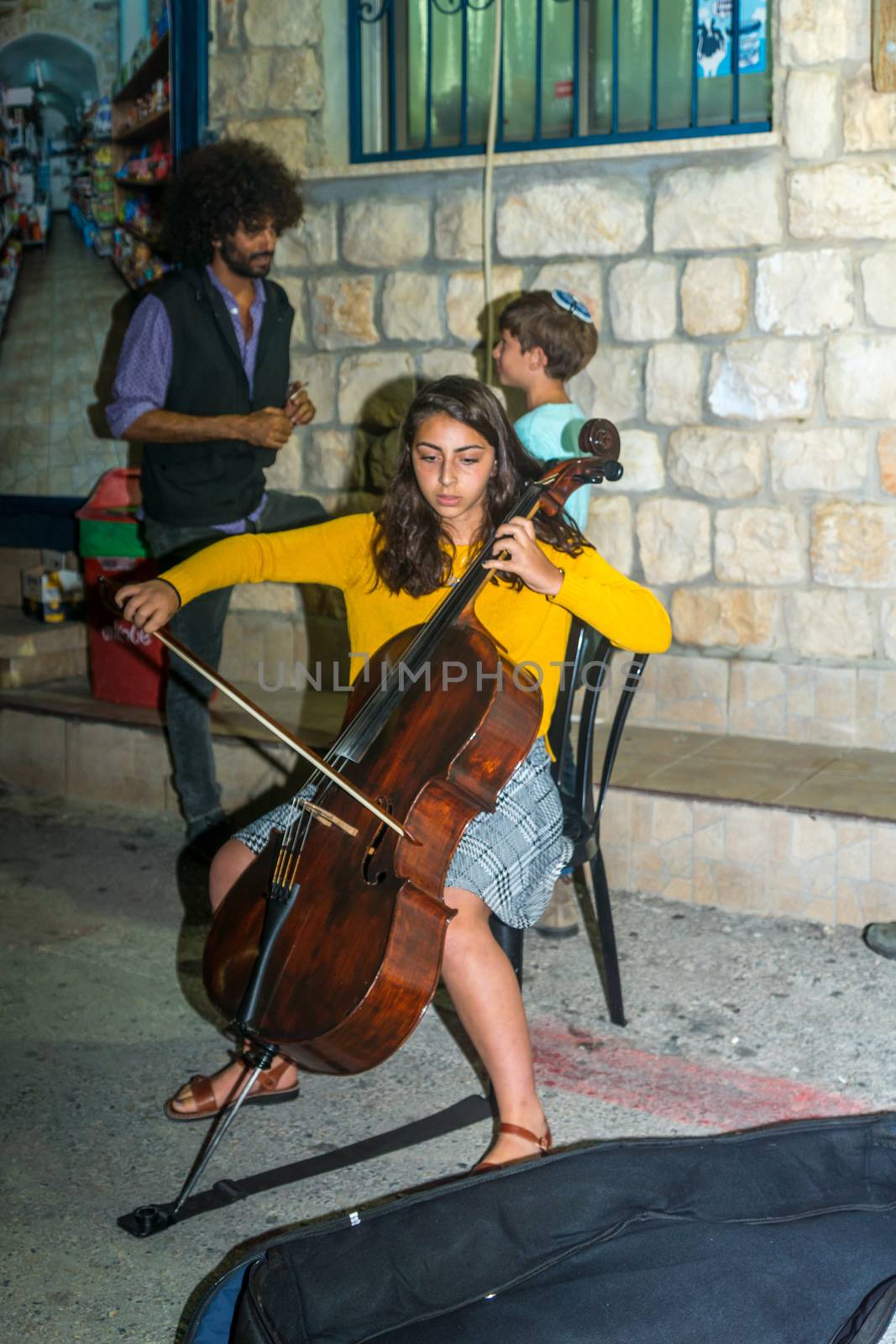 Safed, Israel - August 14, 2018: Scene of the Klezmer Festival, with musician and visitors, in Safed (Tzfat), Israel. Its the 31st annual traditional Jewish festival in the public streets of Safed