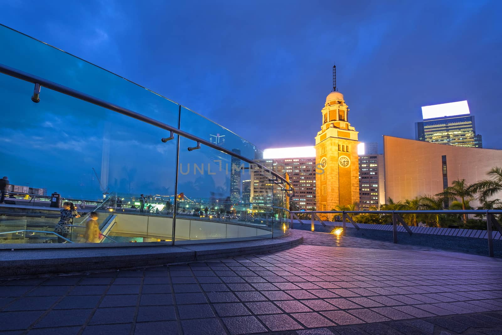 Night view Old Clock Tower in Hong Kong by Surasak