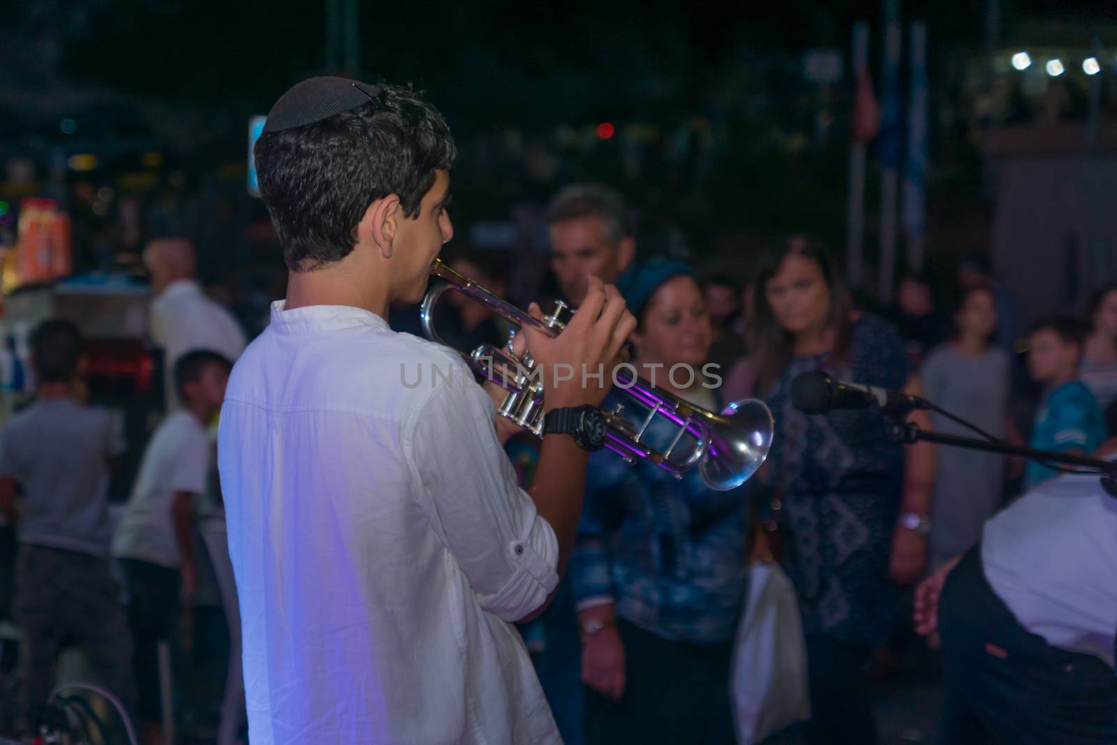 Safed, Israel - August 14, 2018: Scene of the Klezmer Festival, with street musicians and crowd. Safed (Tzfat), Israel. Its the 31st annual traditional Jewish festival in the public streets of Safed