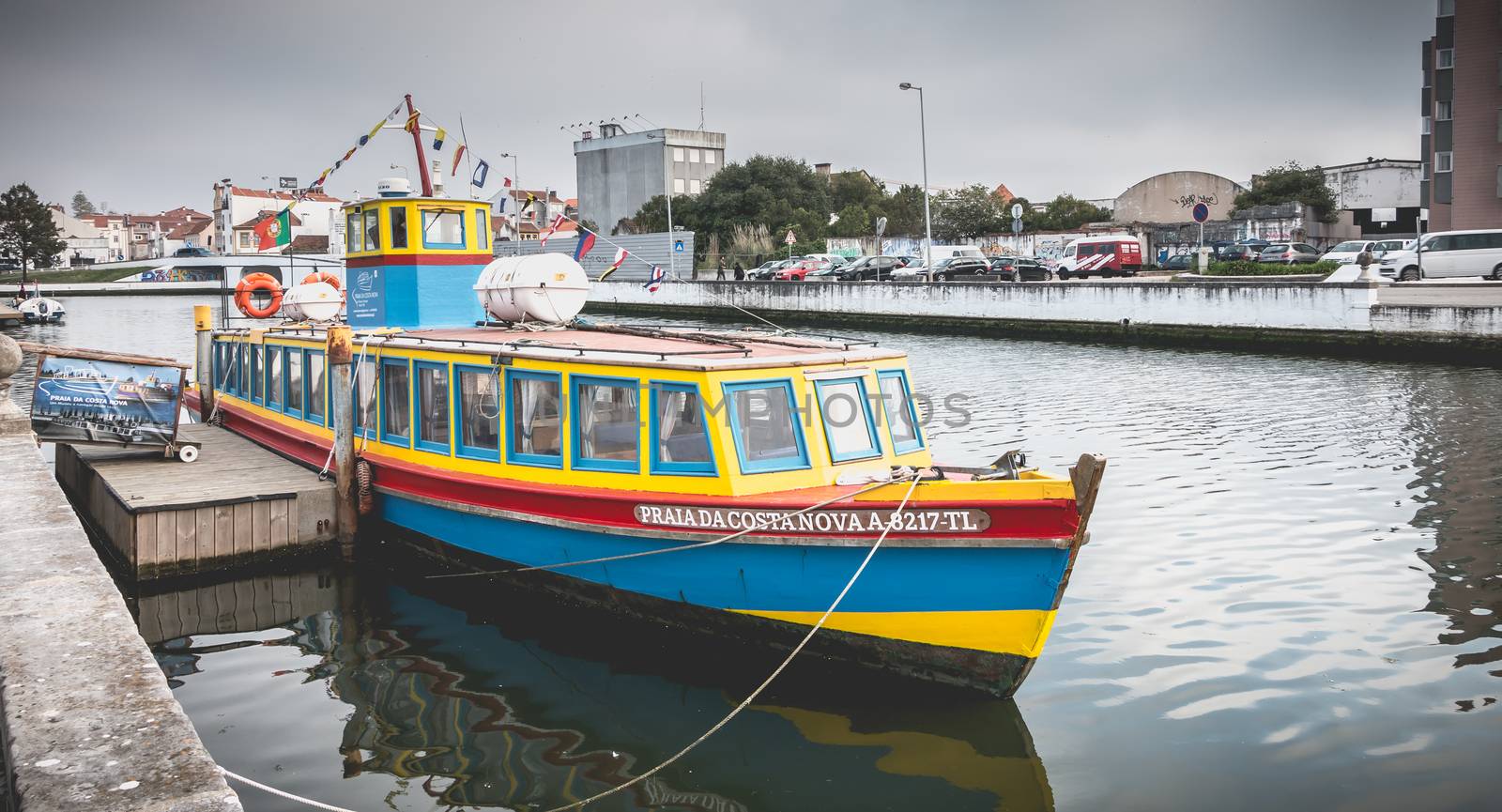 Tourist transport boat docked at the end of the day in aveiro, p by AtlanticEUROSTOXX