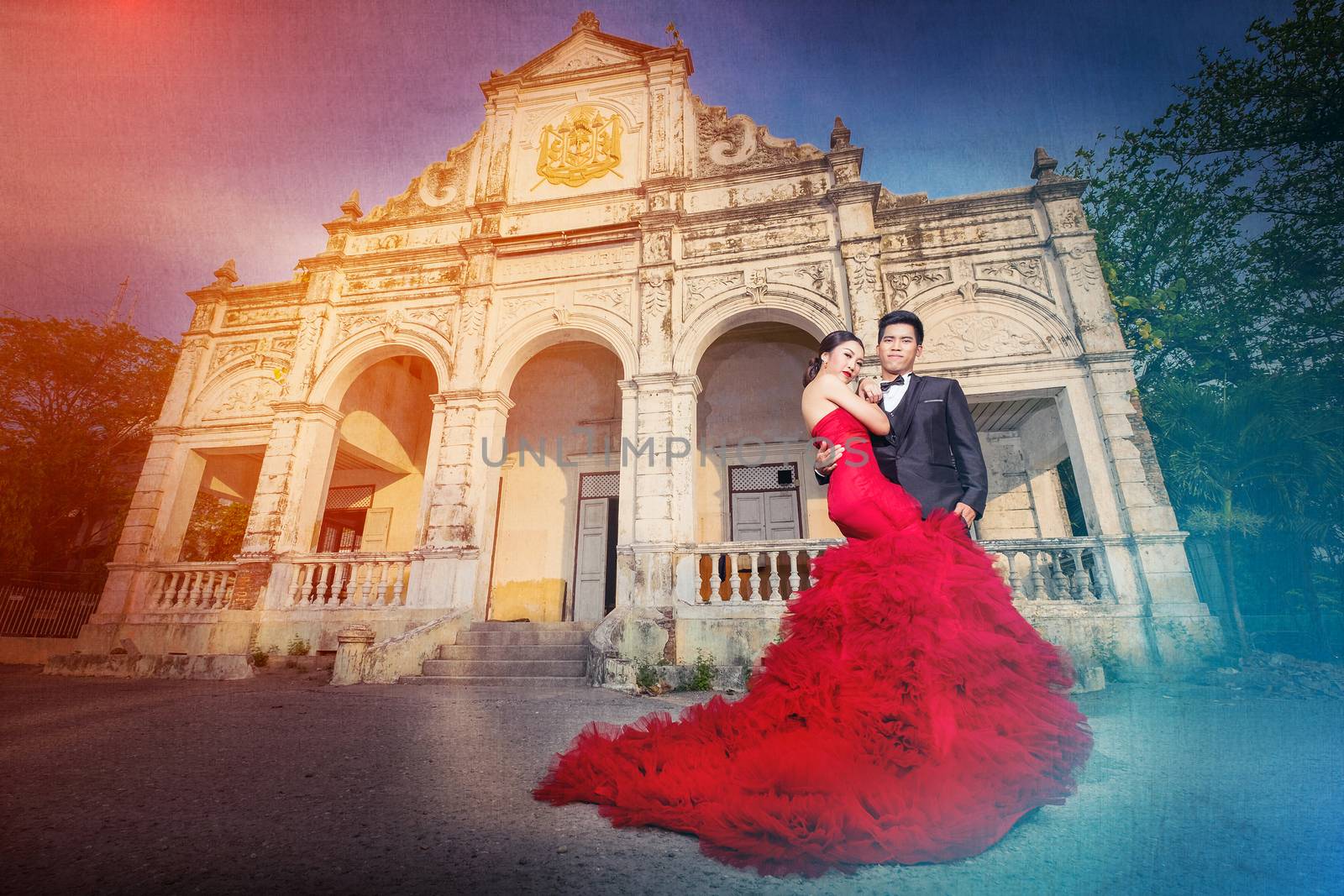 Man and Beautyful woman wearing fashionable red dress