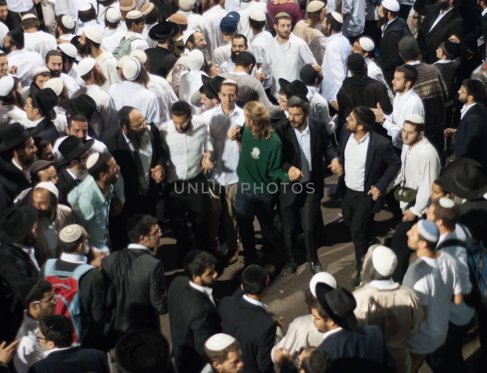 MERON, ISRAEL - MAY 18, 2014: Orthodox Jews dance at the annual hillulah of Rabbi Shimon Bar Yochai, in Meron, on Lag BaOmer Holiday. This is an annual celebration at the tomb of Rabbi Shimon