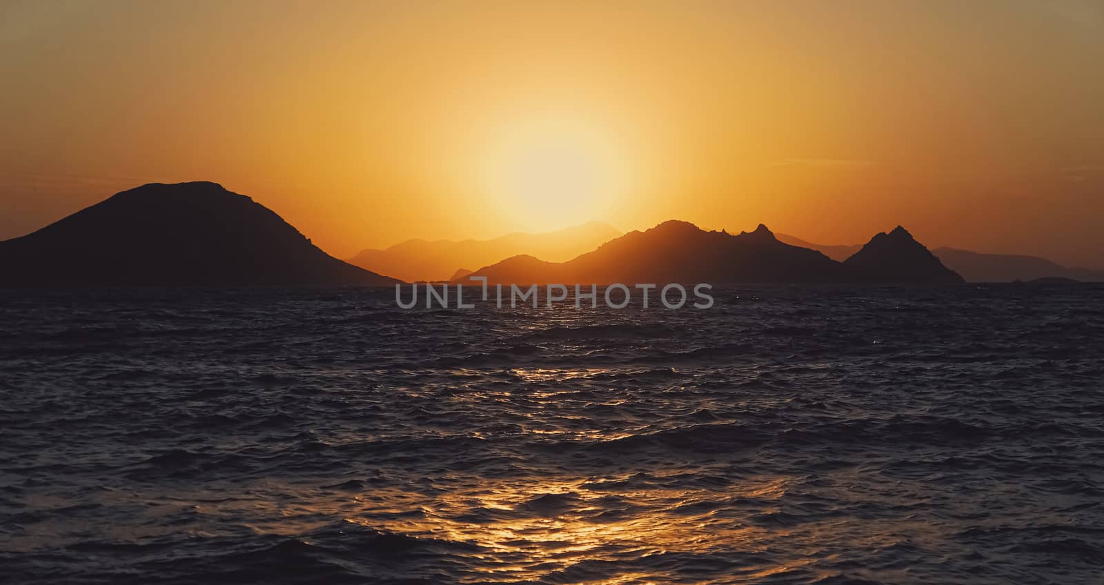 Beautiful sea view and mountains in the Mediterranean at sunset, summer vacation travel and holiday destination