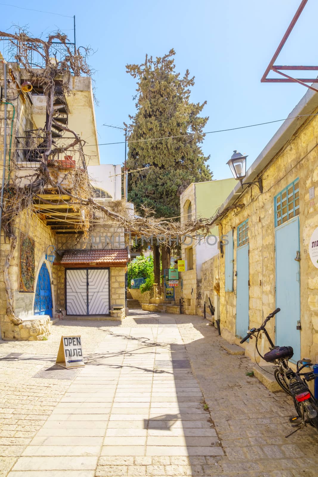 SAFED, ISRAEL - SEPTEMBER 18, 2015: An alley in the artist quarter, with local galleries and other businesses, in Safed, Israel