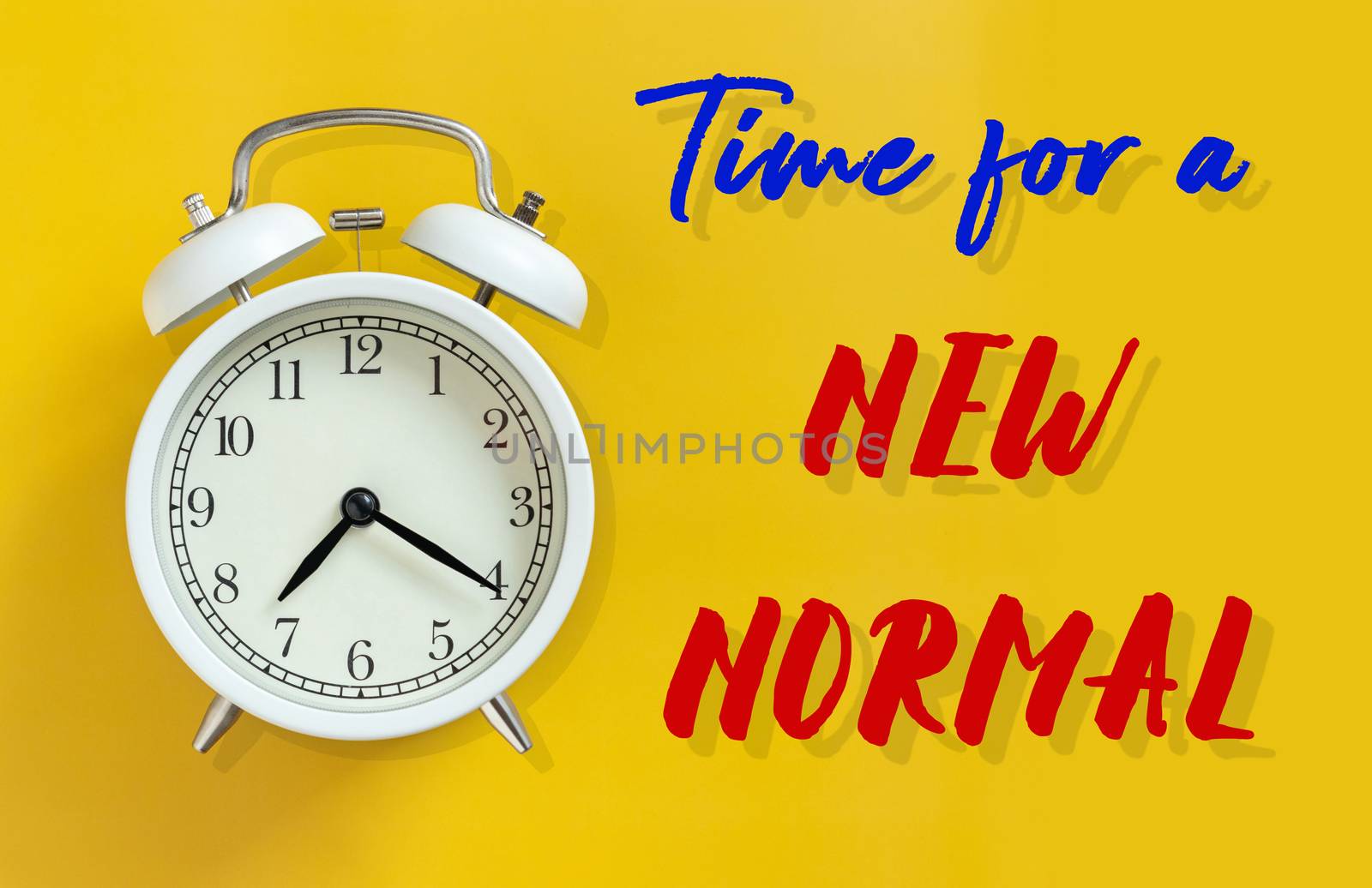 the new normal after COVID-19 Coronavirus pandemic concept. white alarm clock isolated on yellow background with text time for a new normal. a previously unfamiliar situation that has become standard by asiandelight