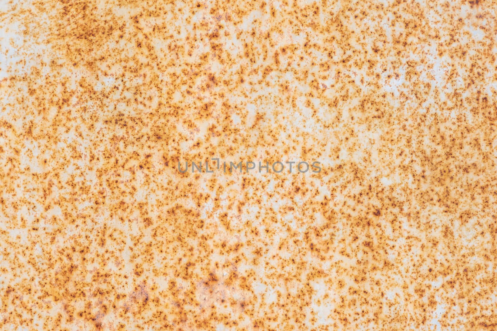 Rust texture on white surface close up view