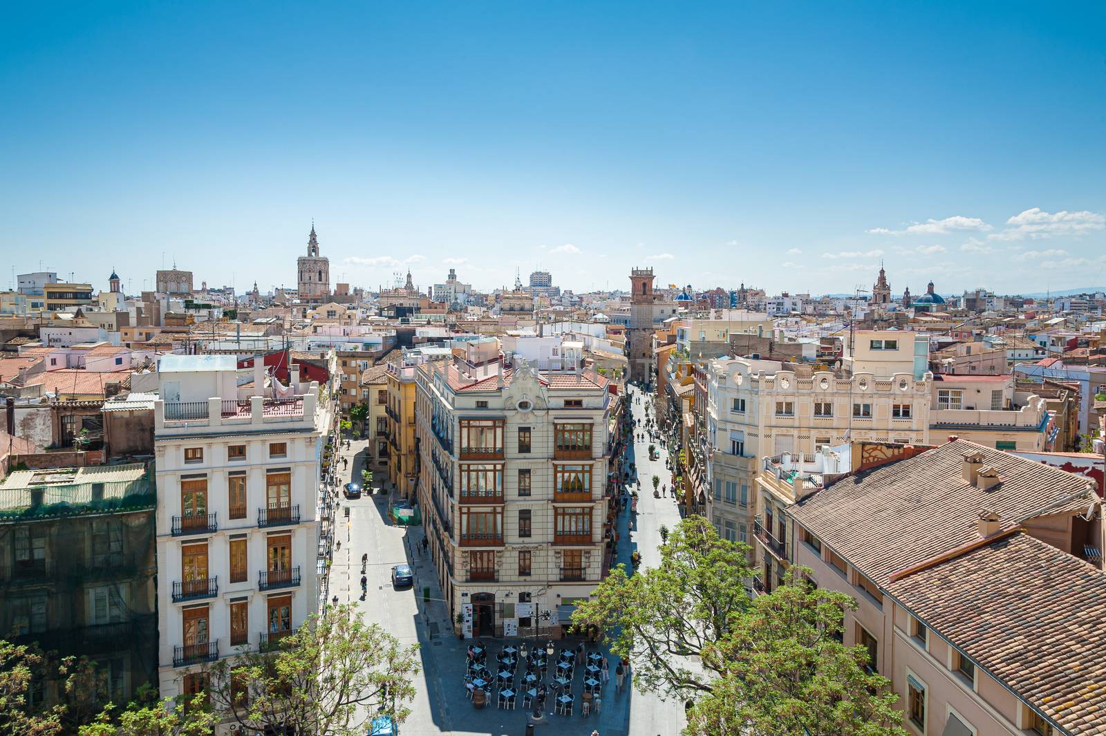 View at Valencia downtown with people walking in the street. Rooftops of Valencia downtown. Spain. Europe.