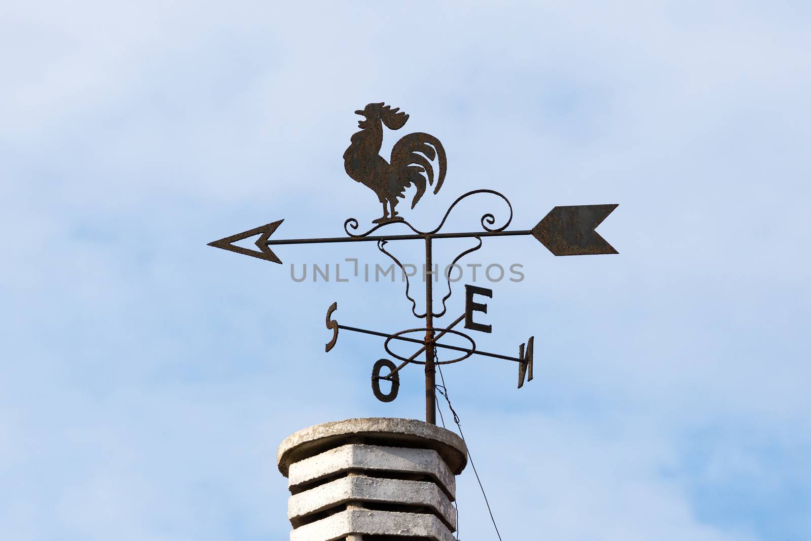 Weathercock on the chimney