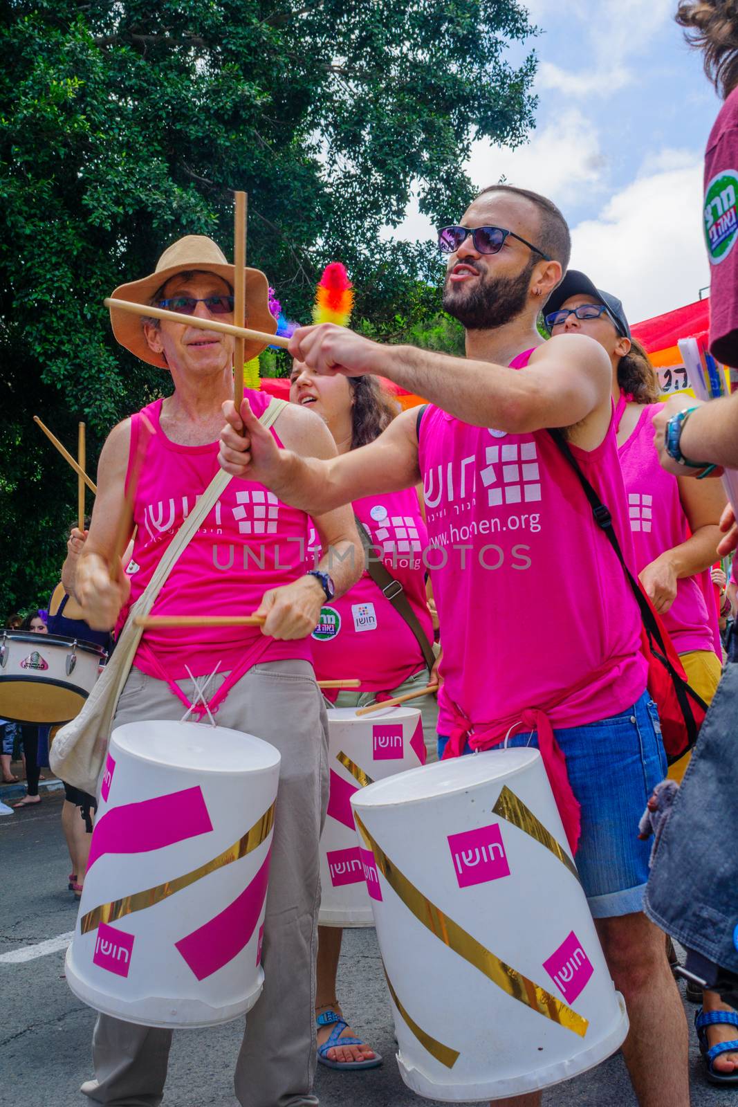 HAIFA, Israel - June 30, 2017: People play music, as part of the annual pride parade of the LGBT community, in the streets of Haifa, Israel