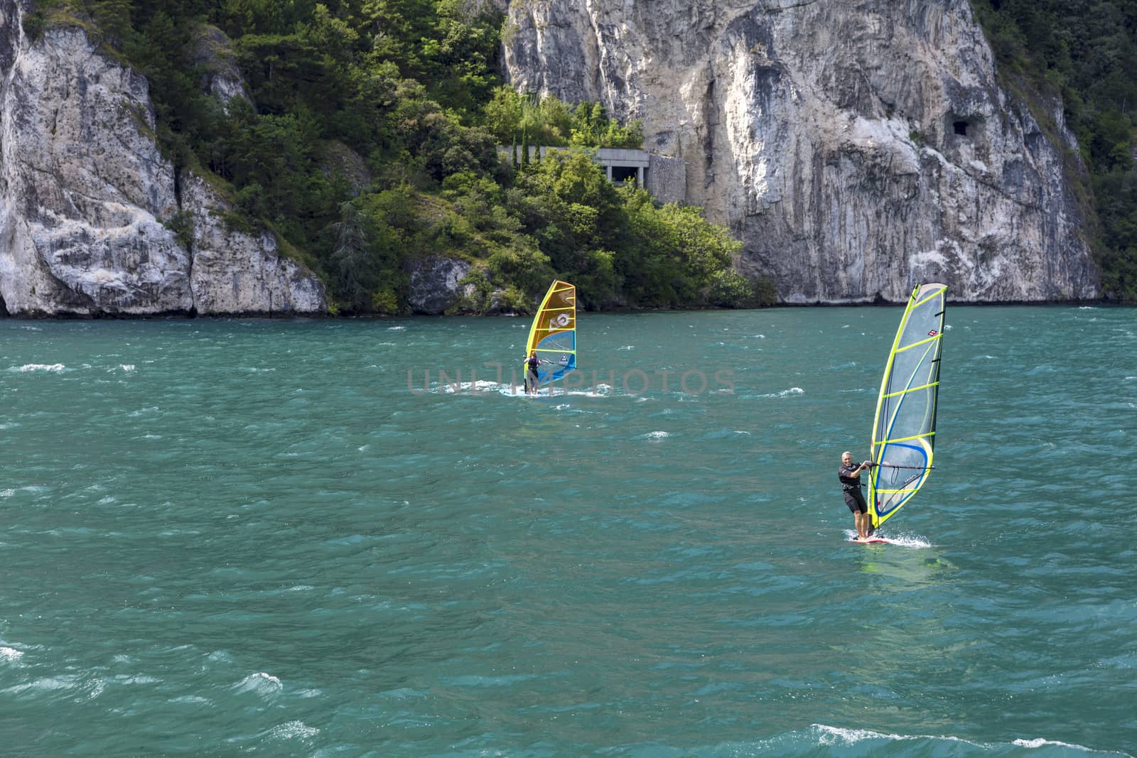 Lake Garda, Italy, August 2019, some windsurfing on the lake