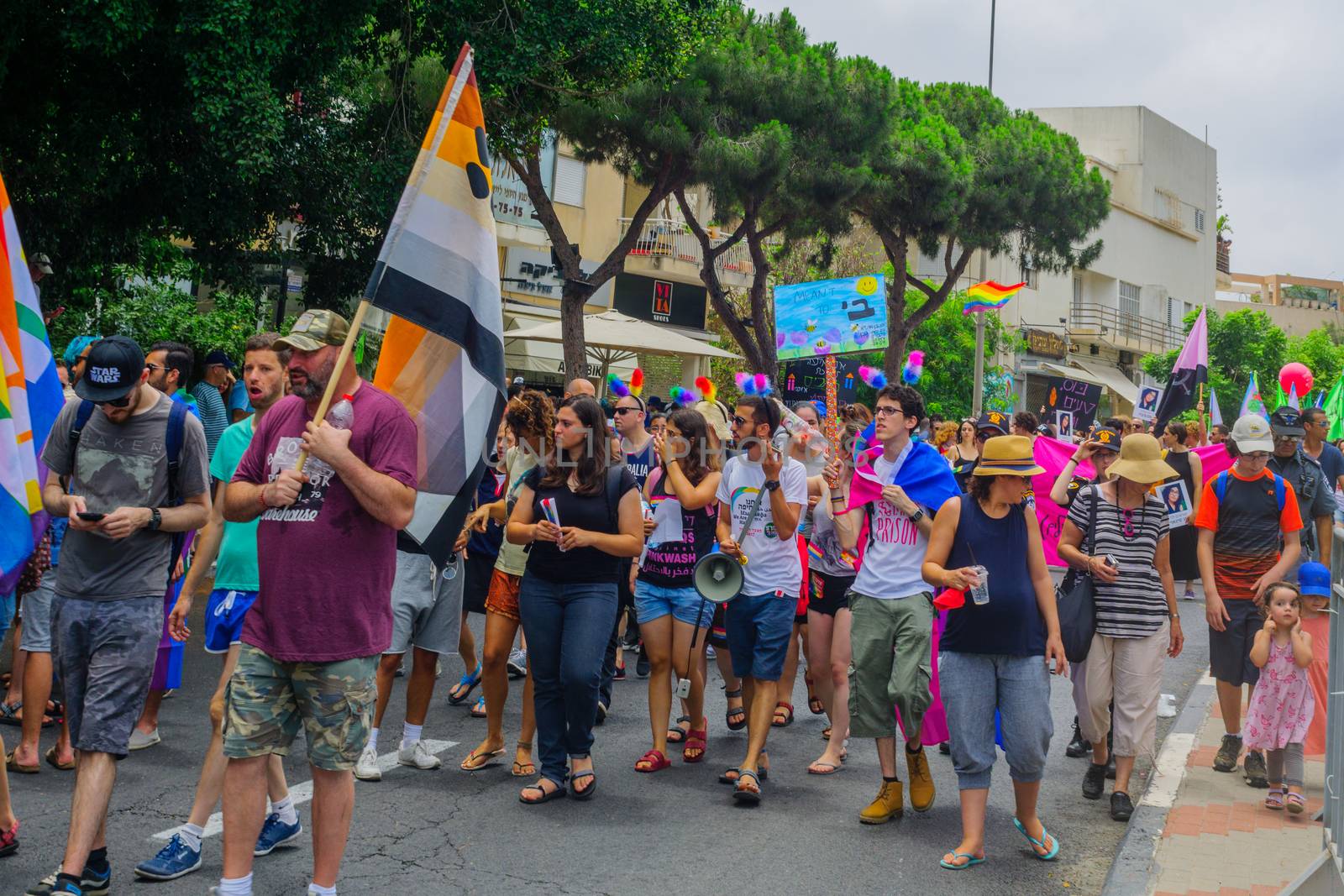 HAIFA, Israel - June 30, 2017: People march in the annual pride parade of the LGBT community, in the streets of Haifa, Israel