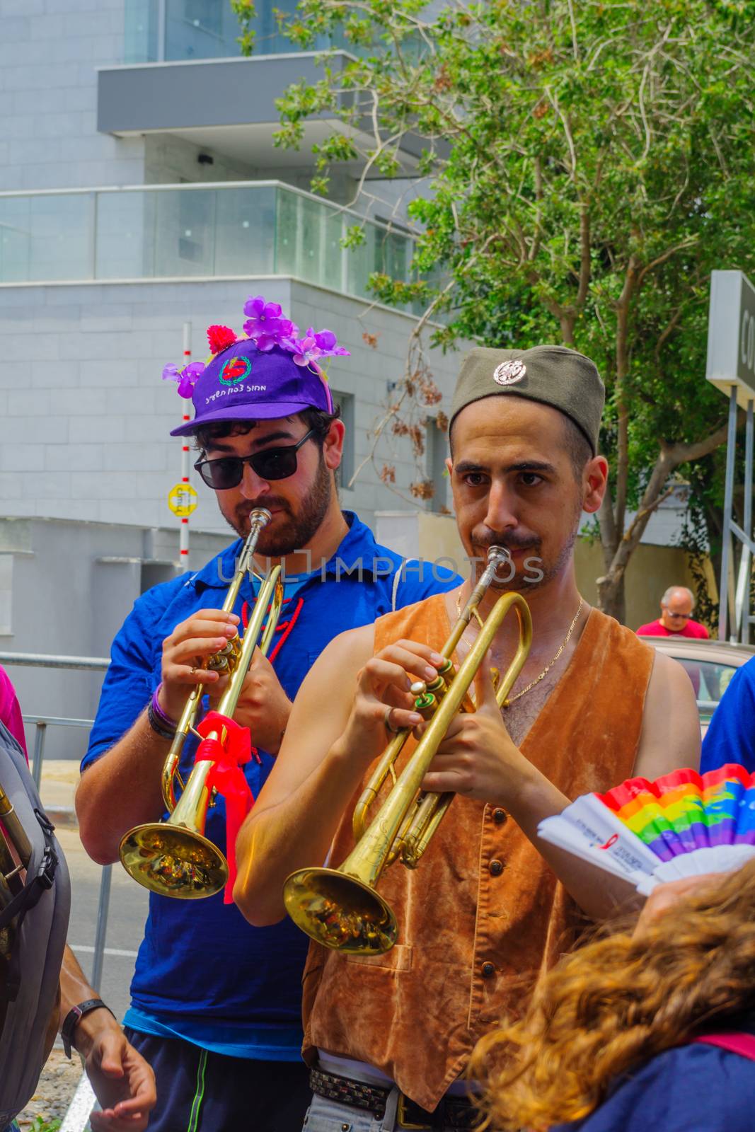 HAIFA, Israel - June 30, 2017: People play music, as part of the annual pride parade of the LGBT community, in the streets of Haifa, Israel