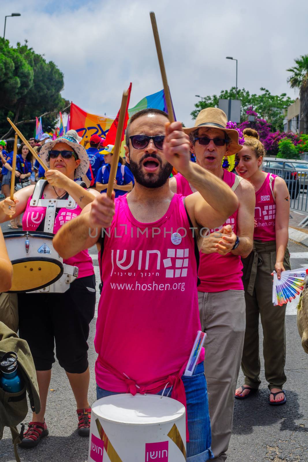 HAIFA, Israel - June 30, 2017: People play music, as part of the annual pride parade of the LGBT community, in the streets of Haifa, Israel