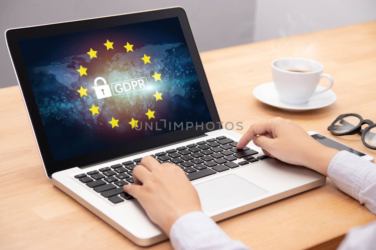 people using computer laptop with text GDPR or General Data Protection Regulation secure , star and padlock logo on monitor screen. cyber security and privacy concept.
