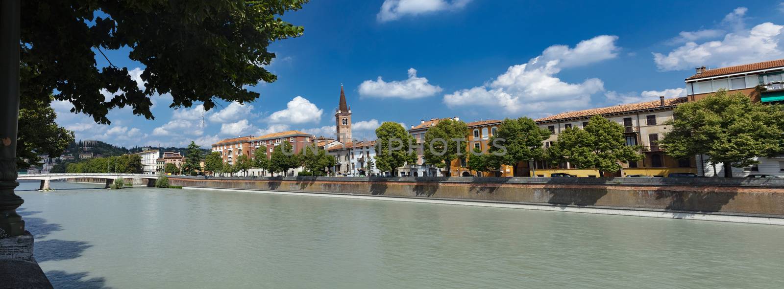 Verona, Italy, Europe, August 2019, A view of the River Adige an by ElectricEggPhoto