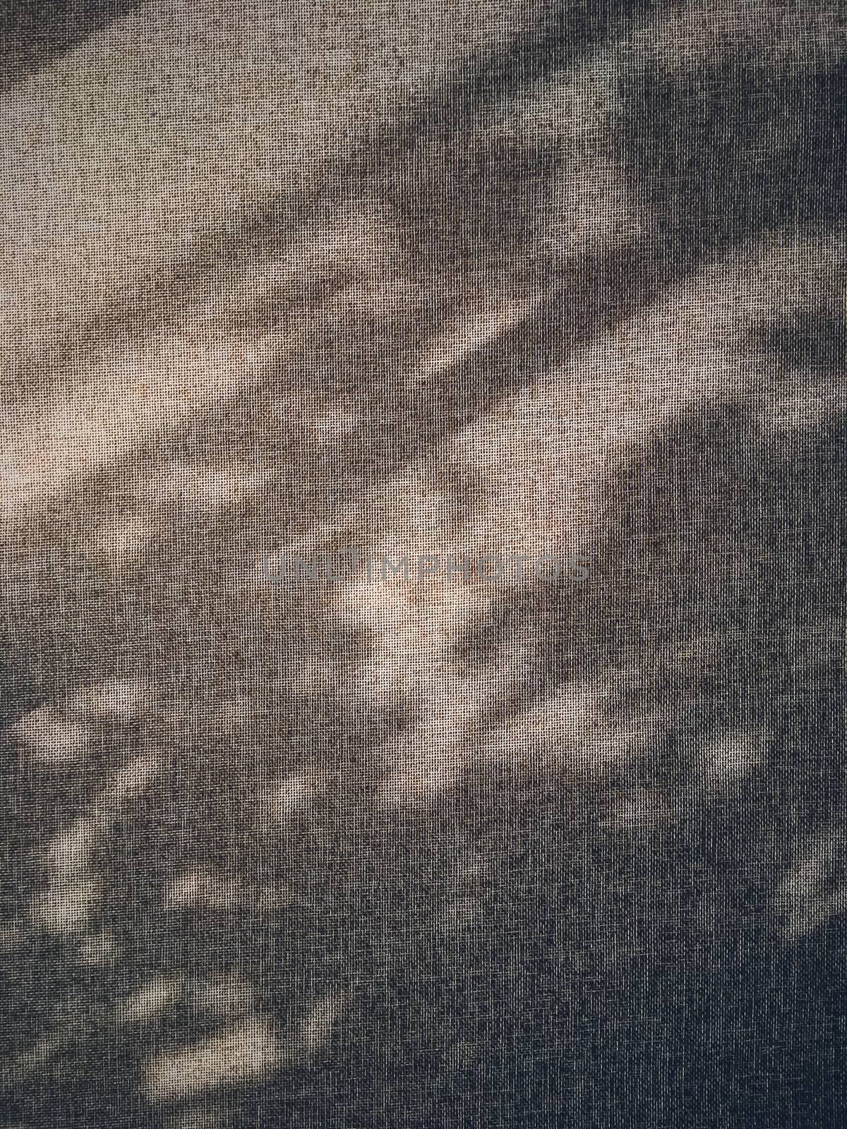 Linen texture and shadows as rustic background, fabric and material
