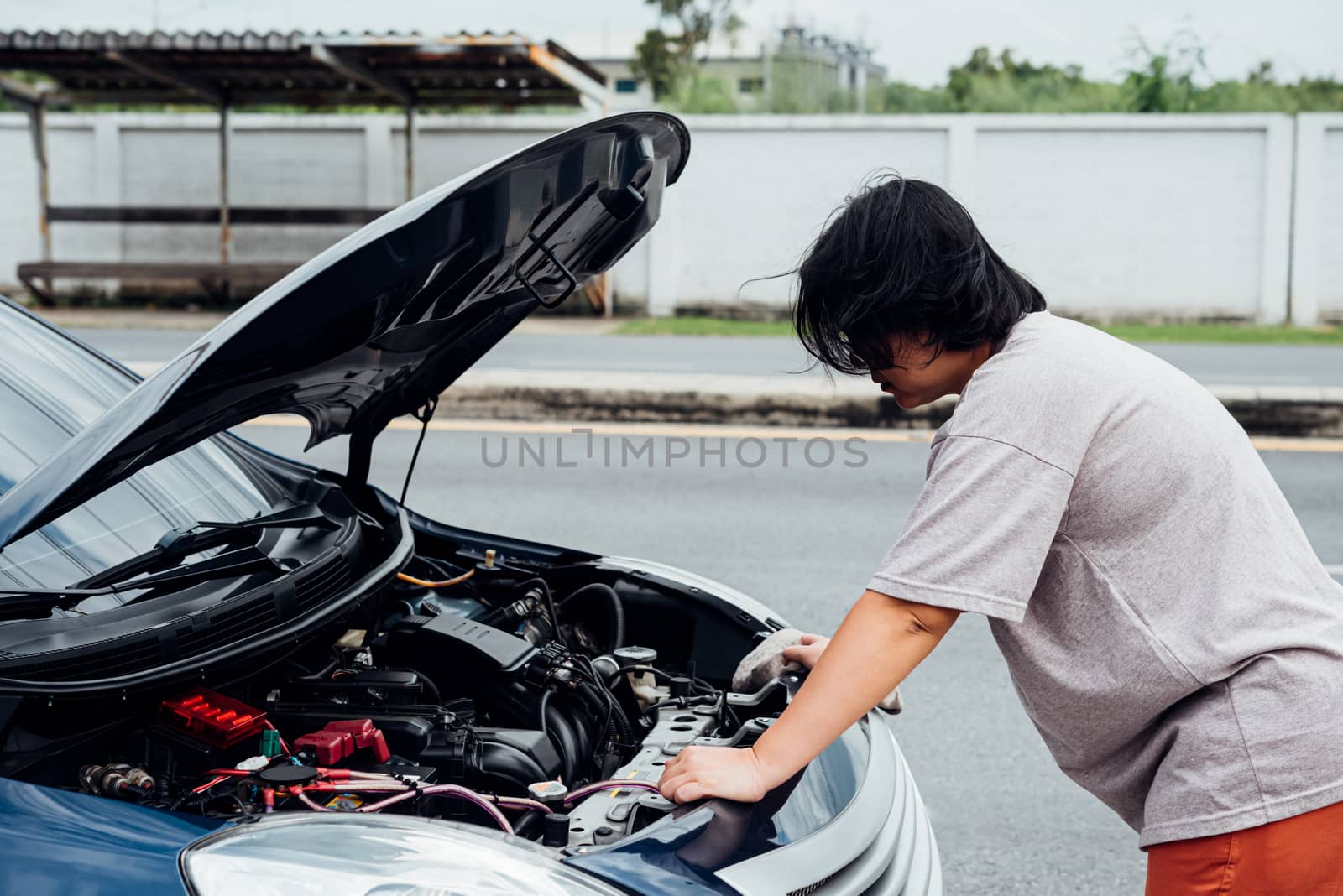 Woman unhappy and dismal from car engine problem by PongMoji