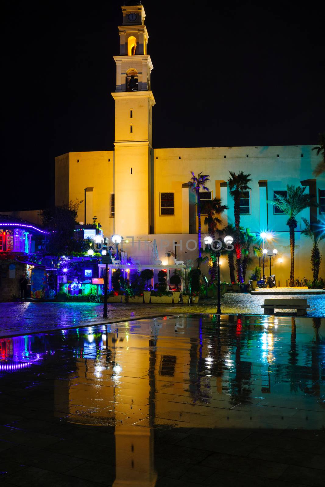 TEL-AVIV, ISRAEL - JANUARY 25, 2016: Night view of Kedumim square and the St. Peter Church, in the old city of Jaffa, Now part of Tel-Aviv Yafo, Israel