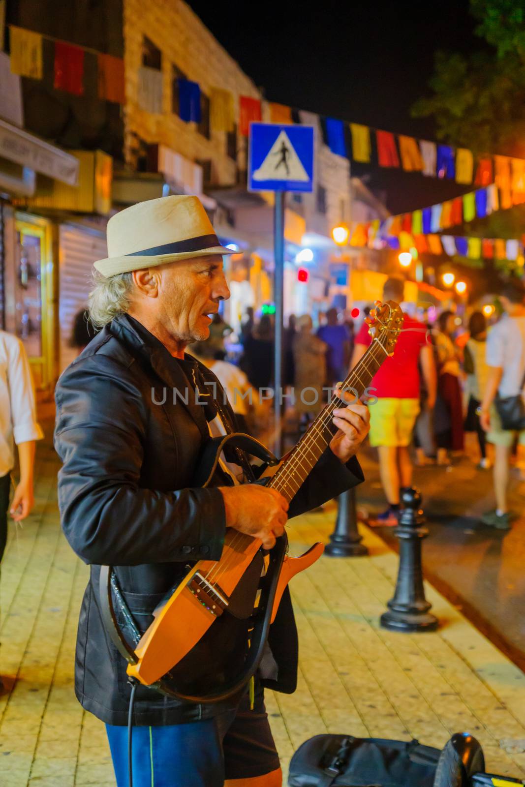 SAFED, ISRAEL - AUGUST 23, 2017: Scene of the Klezmer Festival, with street musicians playing, in Safed (Tzfat), Israel. Its the 30th annual traditional Jewish festival in the public streets of Safed