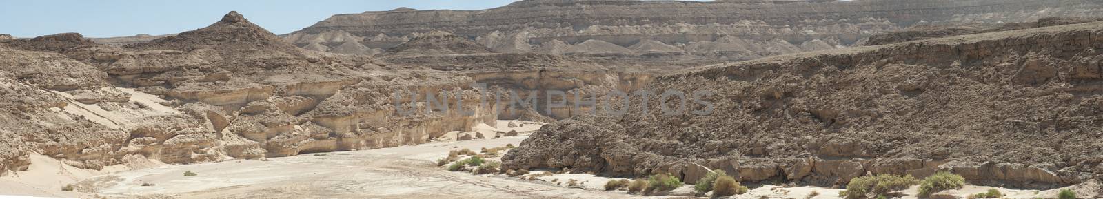 Rocky mountain slope landscape in an arid desert environment