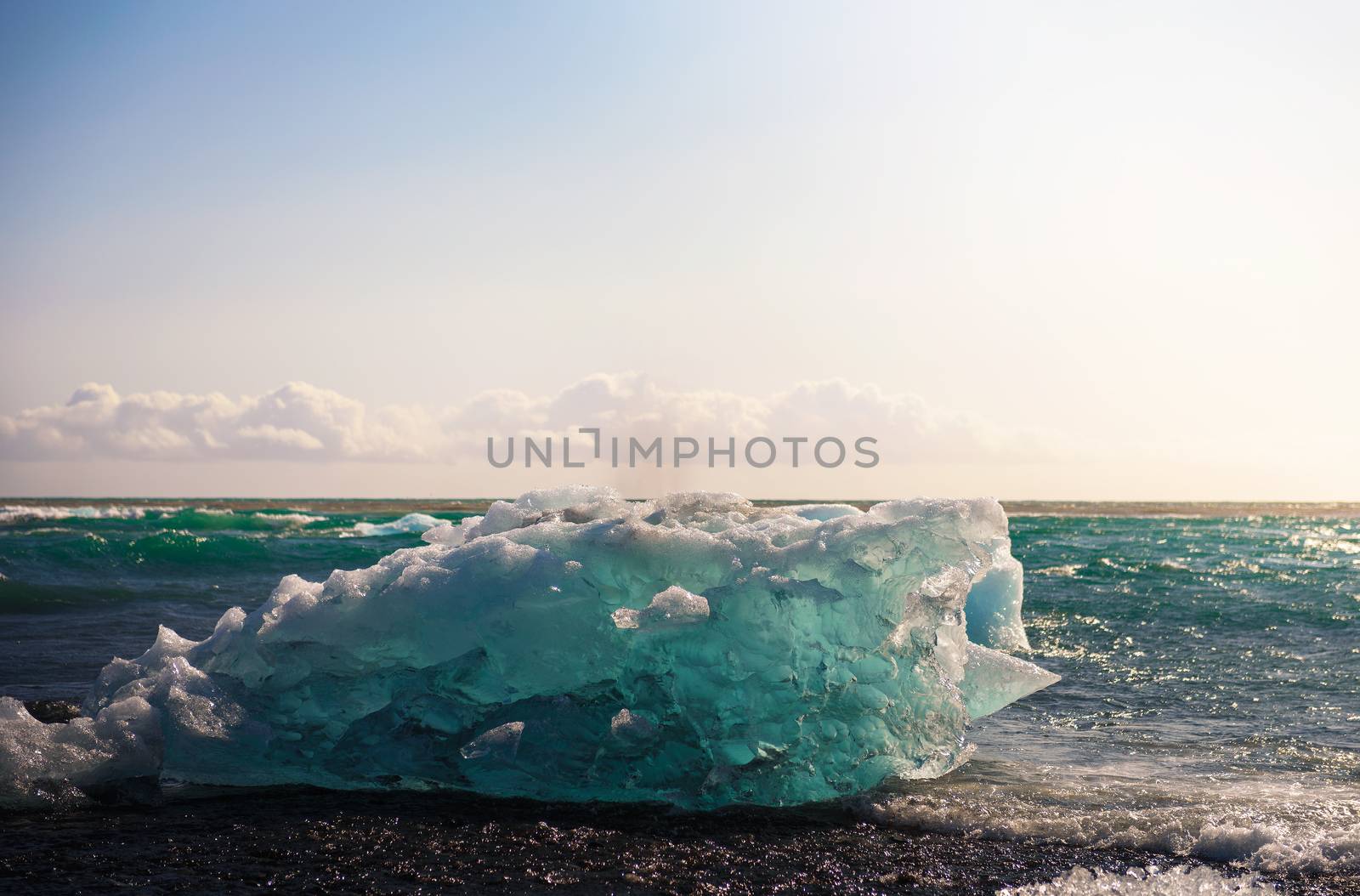 Iceberg lying on the Diamond Beach located in Jokulsarlon Glacier Lagoon in Iceland.